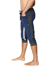 Navy blue and gray ultra-flex tri-color cuffed yoga pant with white stripe accents made from stretchy fabric