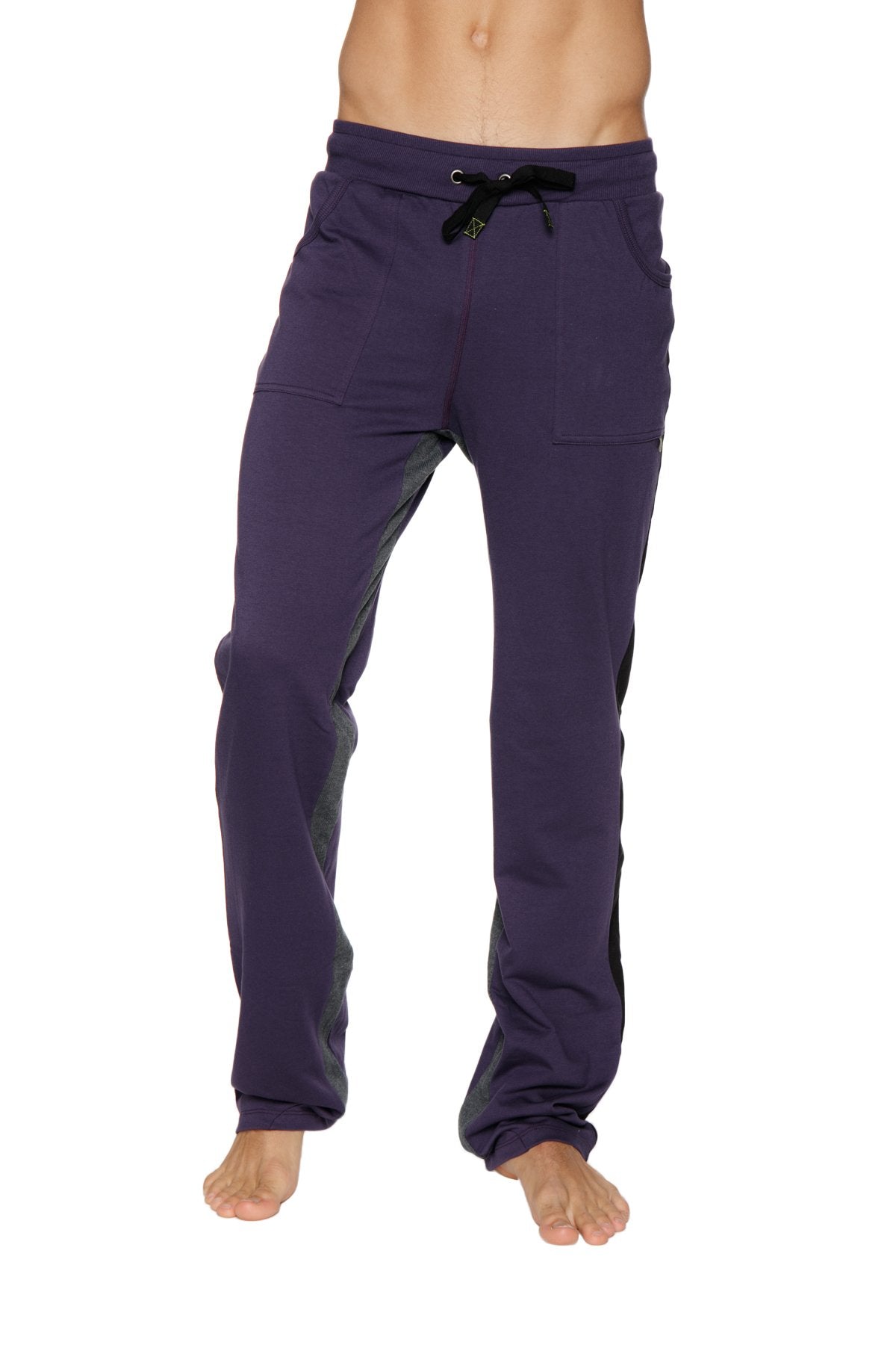 Ultra flex yoga track and sweat pant in eggplant purple with black drawstring and side pockets for athletic use
