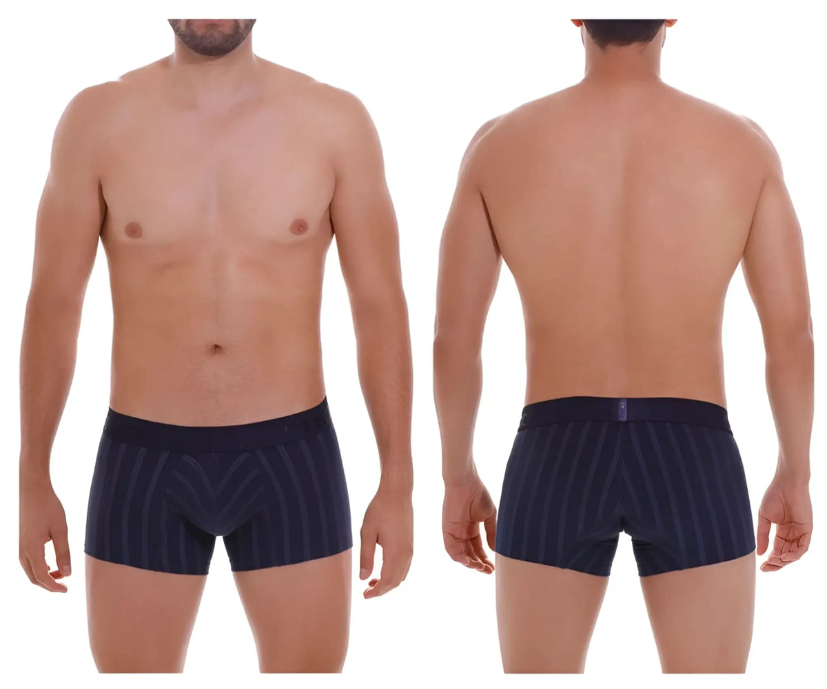 Navy blue Unico Senda trunks with elastic waistband and subtle geometric striped pattern in polyester fabric