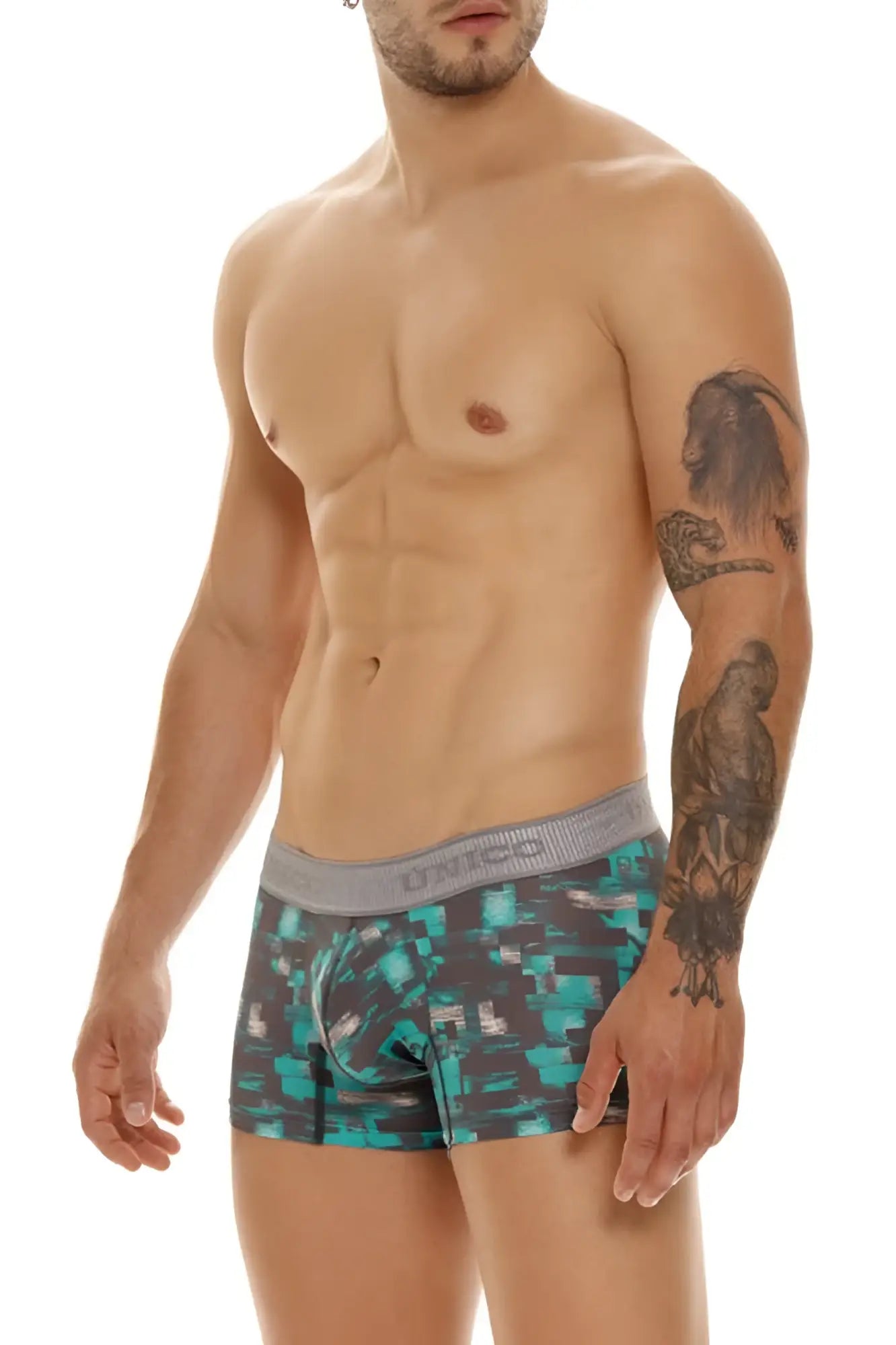 Unico 23050100104 Escaque trunks in teal and black pixelated pattern with gray waistband and unico branding