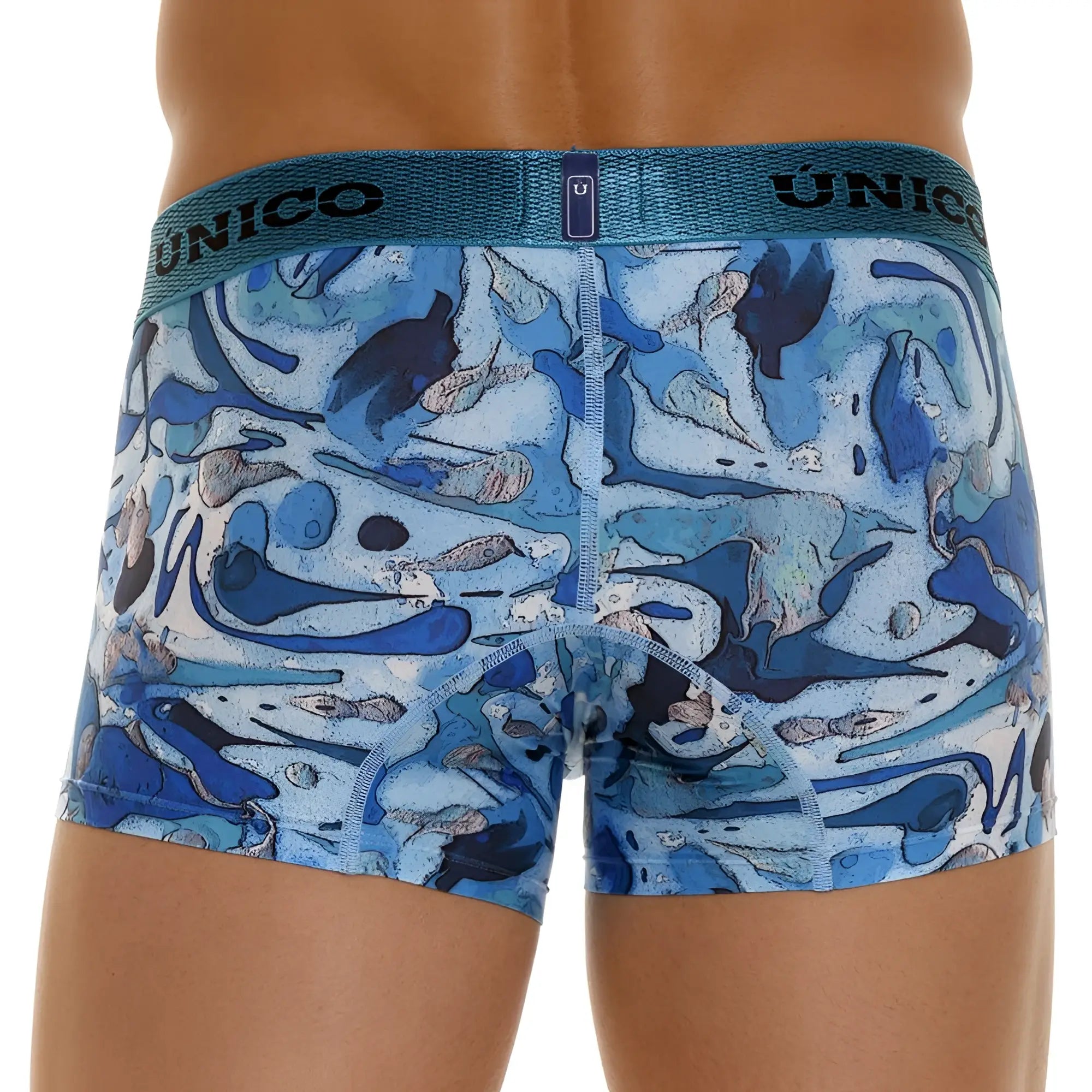 Blue and white abstract patterned unico men’s boxer briefs with textured elastic waistband in color 46 blue