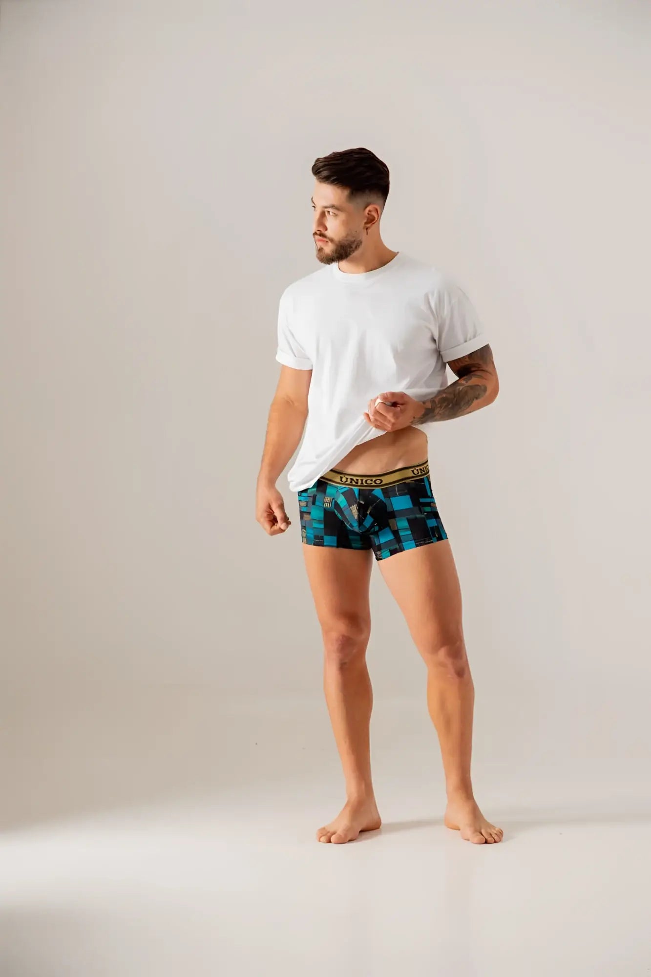 Blue and black geometric patterned boxer briefs with gold virgo waistband unico 24010100104 esquema trunks