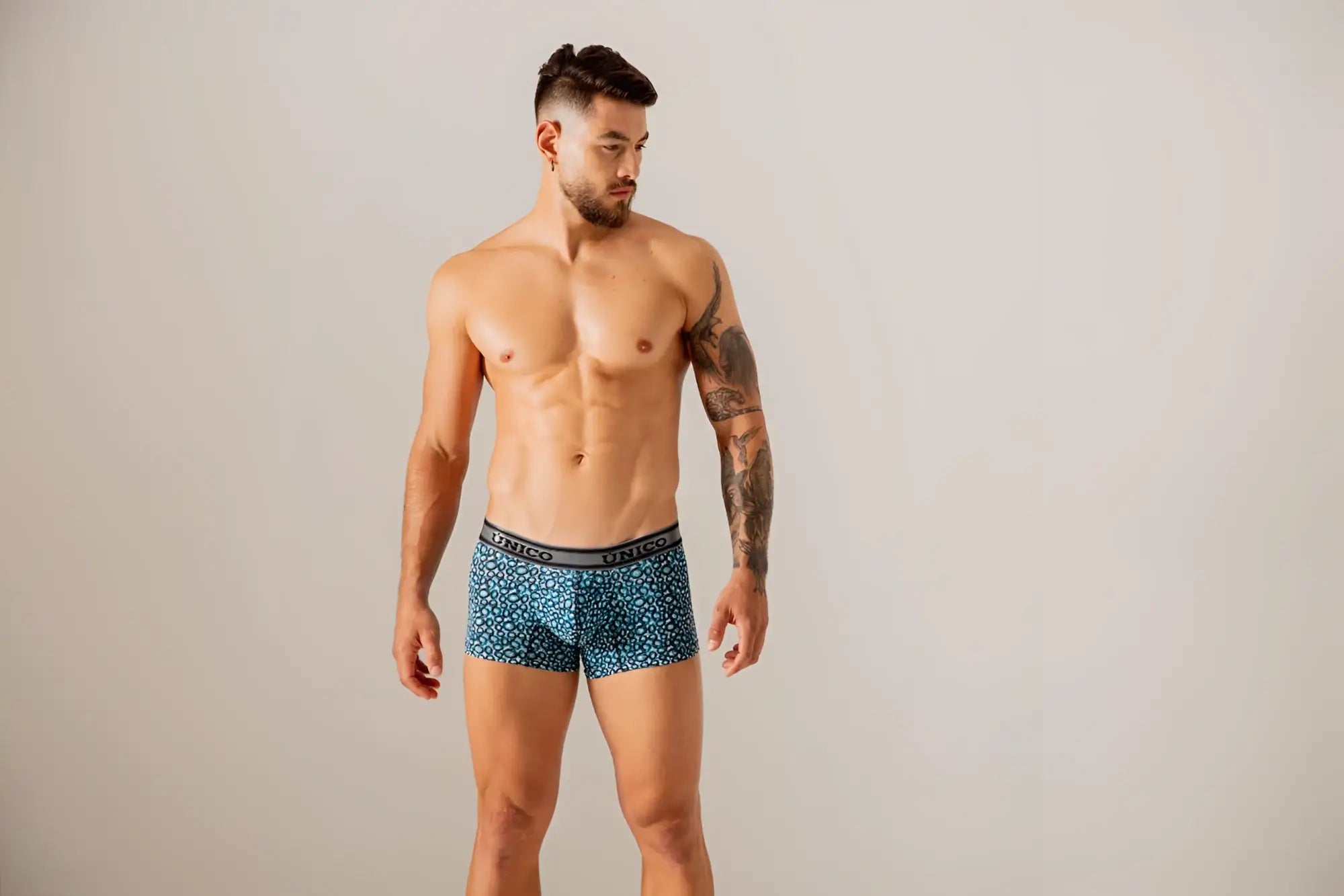 Blue patterned men’s boxer briefs with black unico branded elastic waistband in redondel trunks color 46-blue