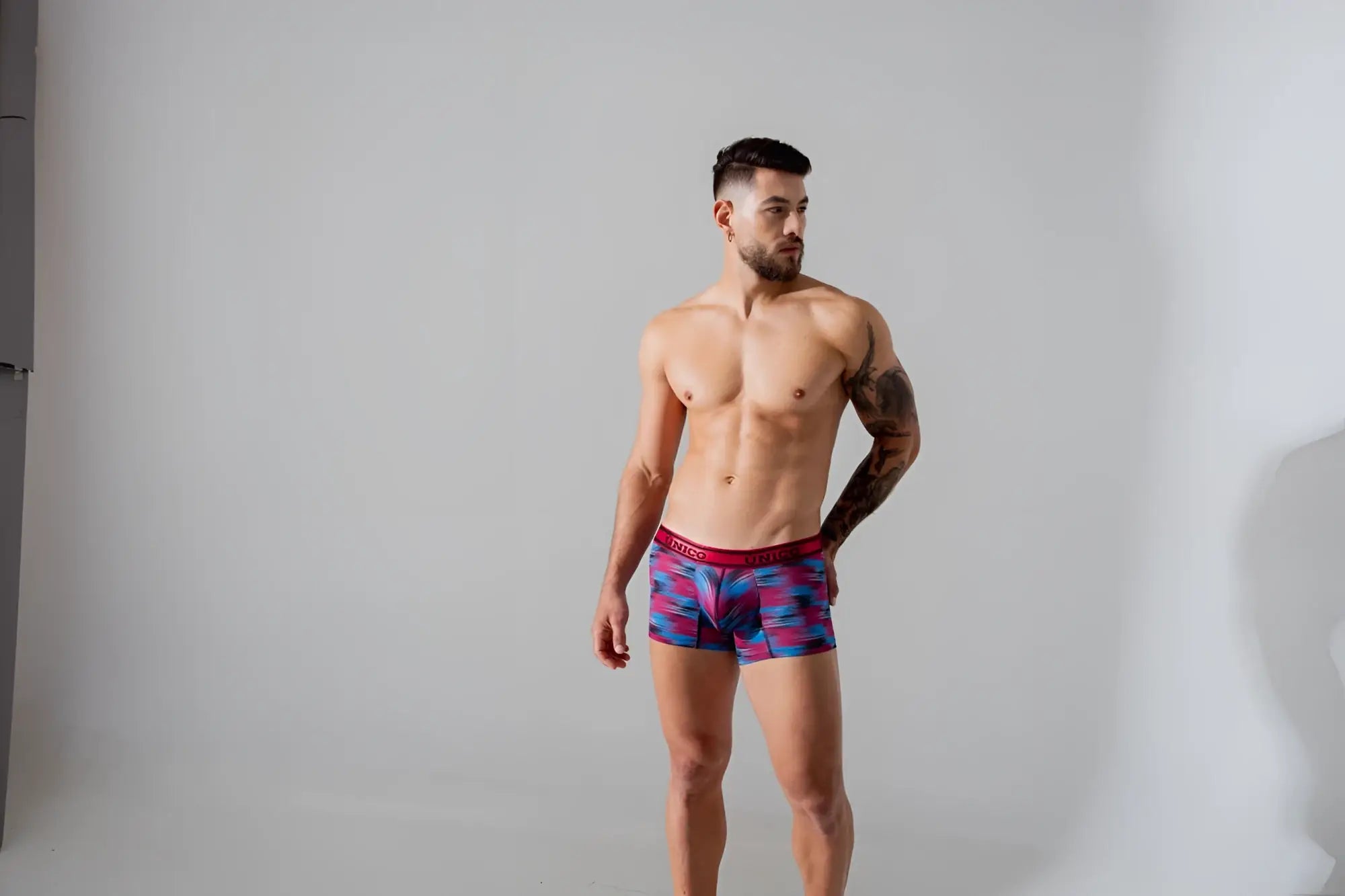 Men’s unico 24020100112 yute trunks boxer briefs with vibrant pink blue and purple geometric pattern and red waistband