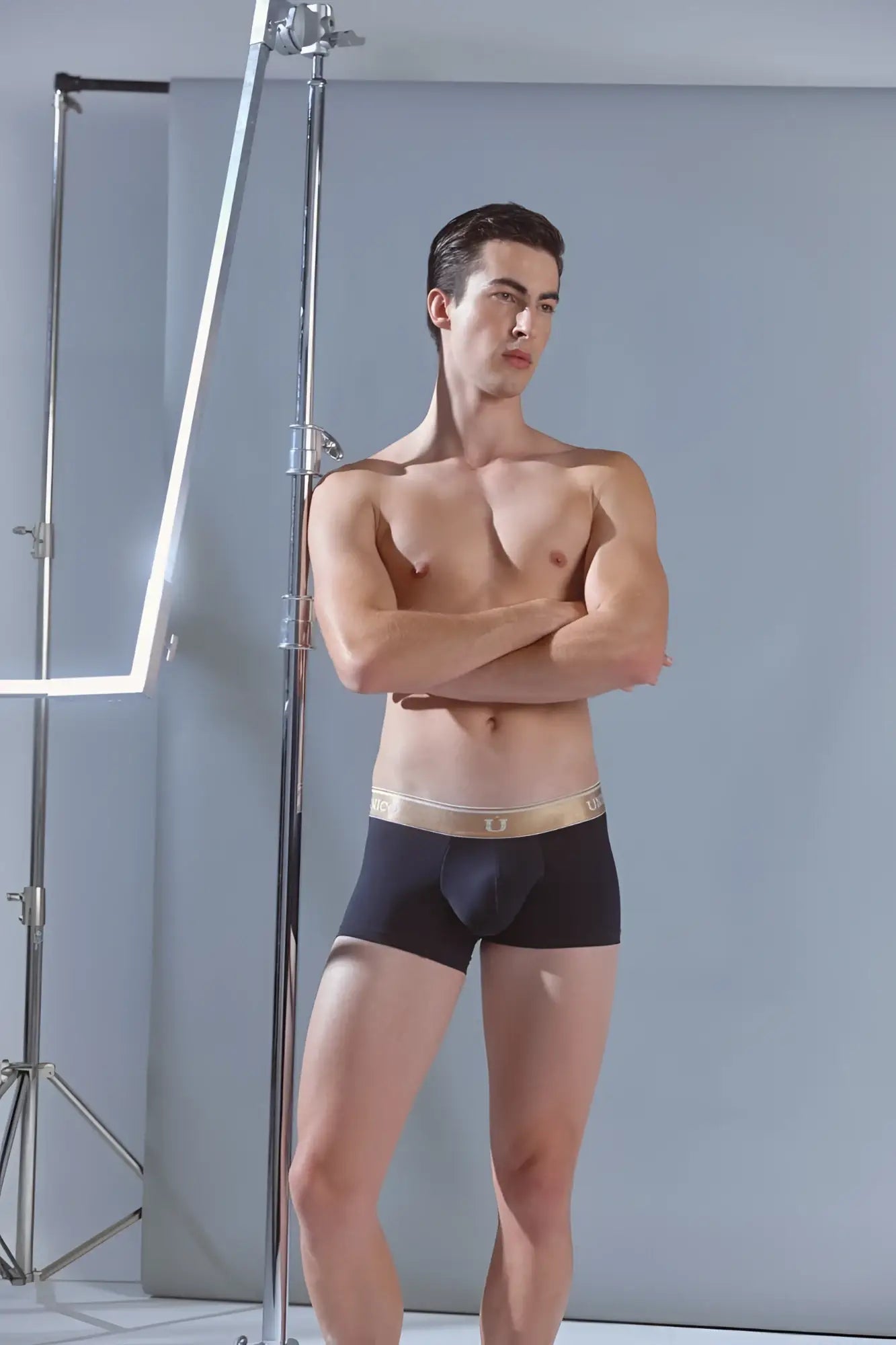 Black men’s Unico 24110100110 Lingote trunks with gold waistband and brand logo in black fabric