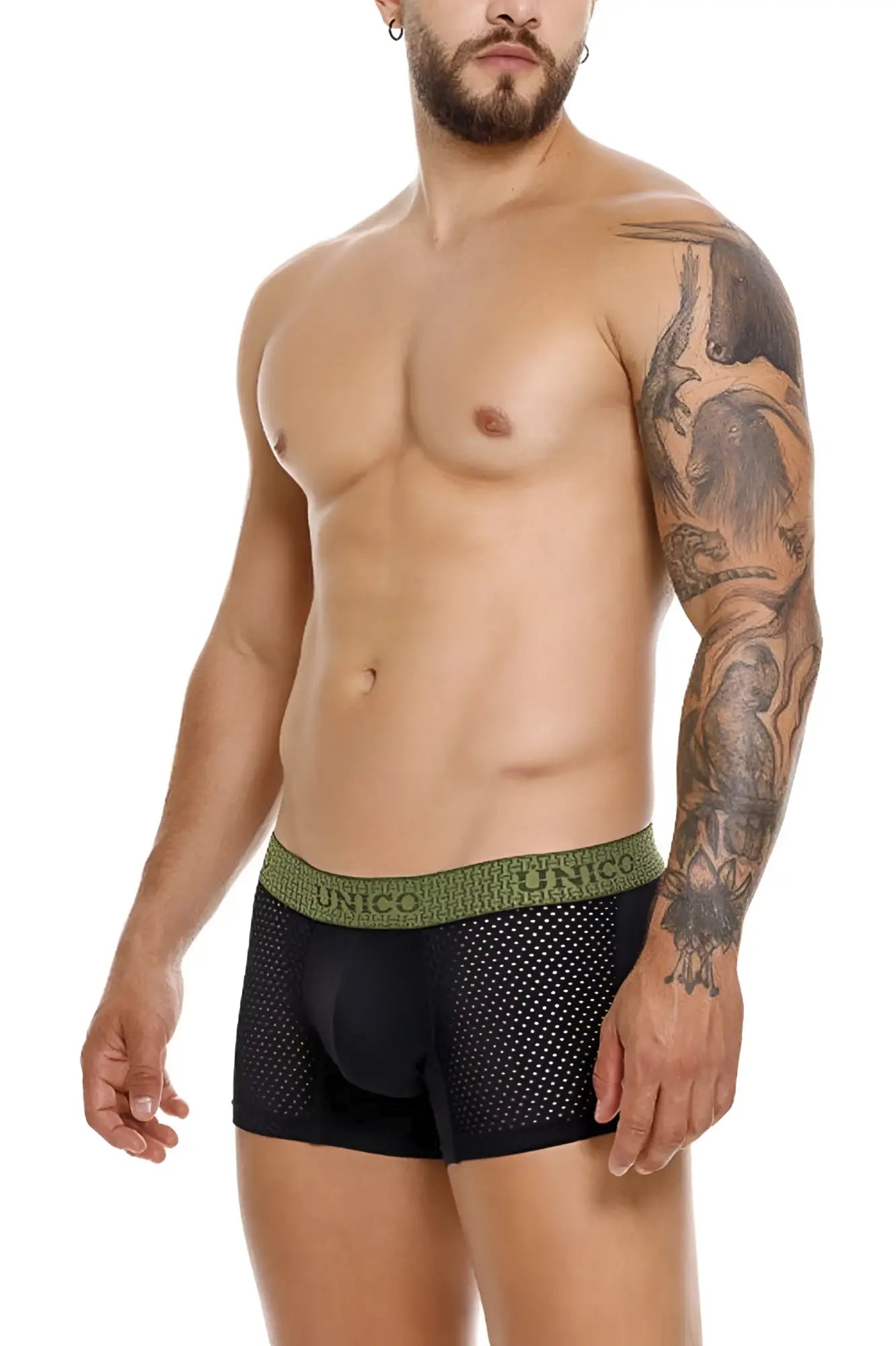 Black mesh unico tribunal trunks with olive green waistband featuring unico brand name in repeating pattern