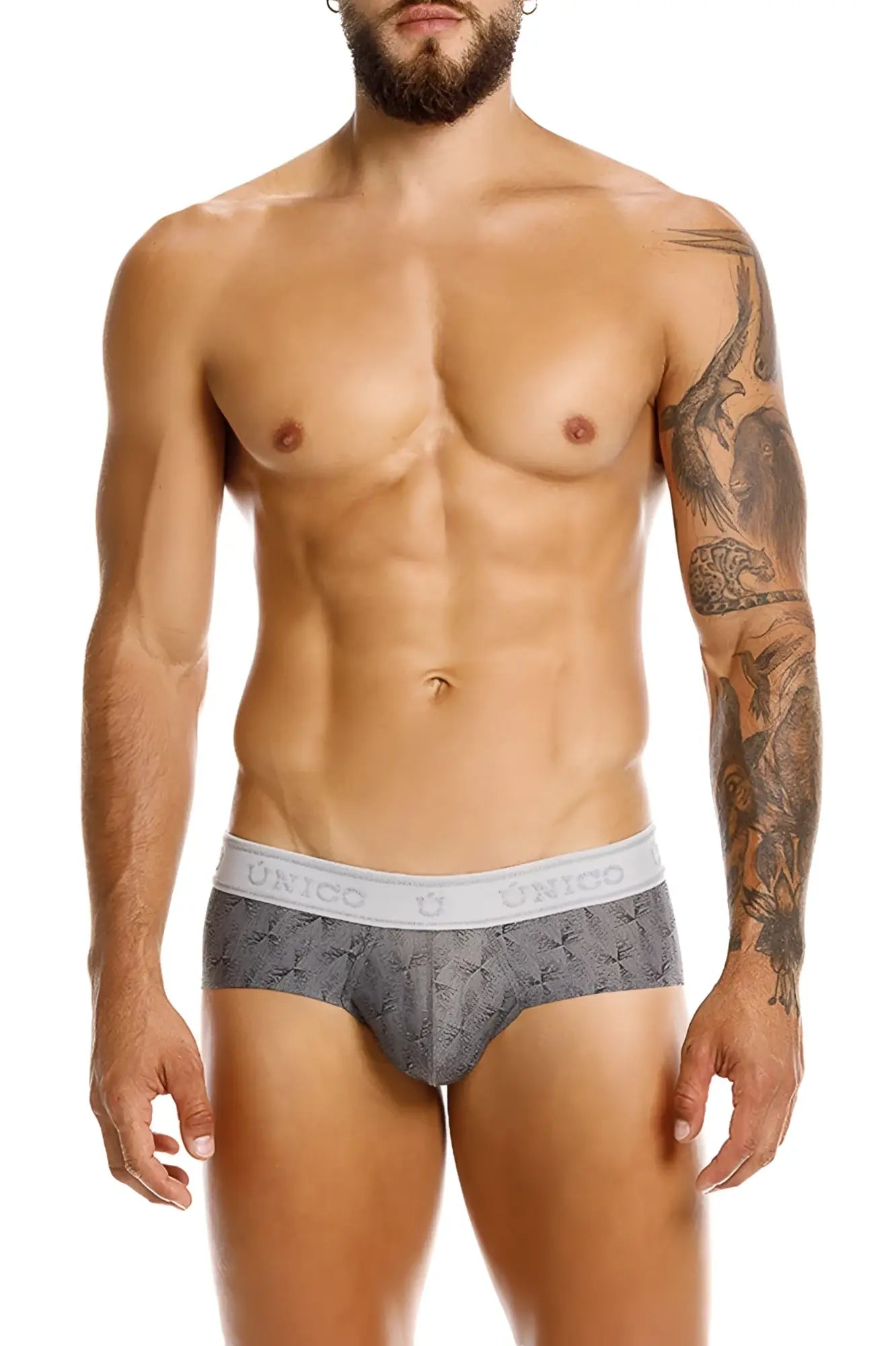 Gray patterned Unico 25050101103 Chisell briefs with a white elastic waistband featuring the Unico brand name