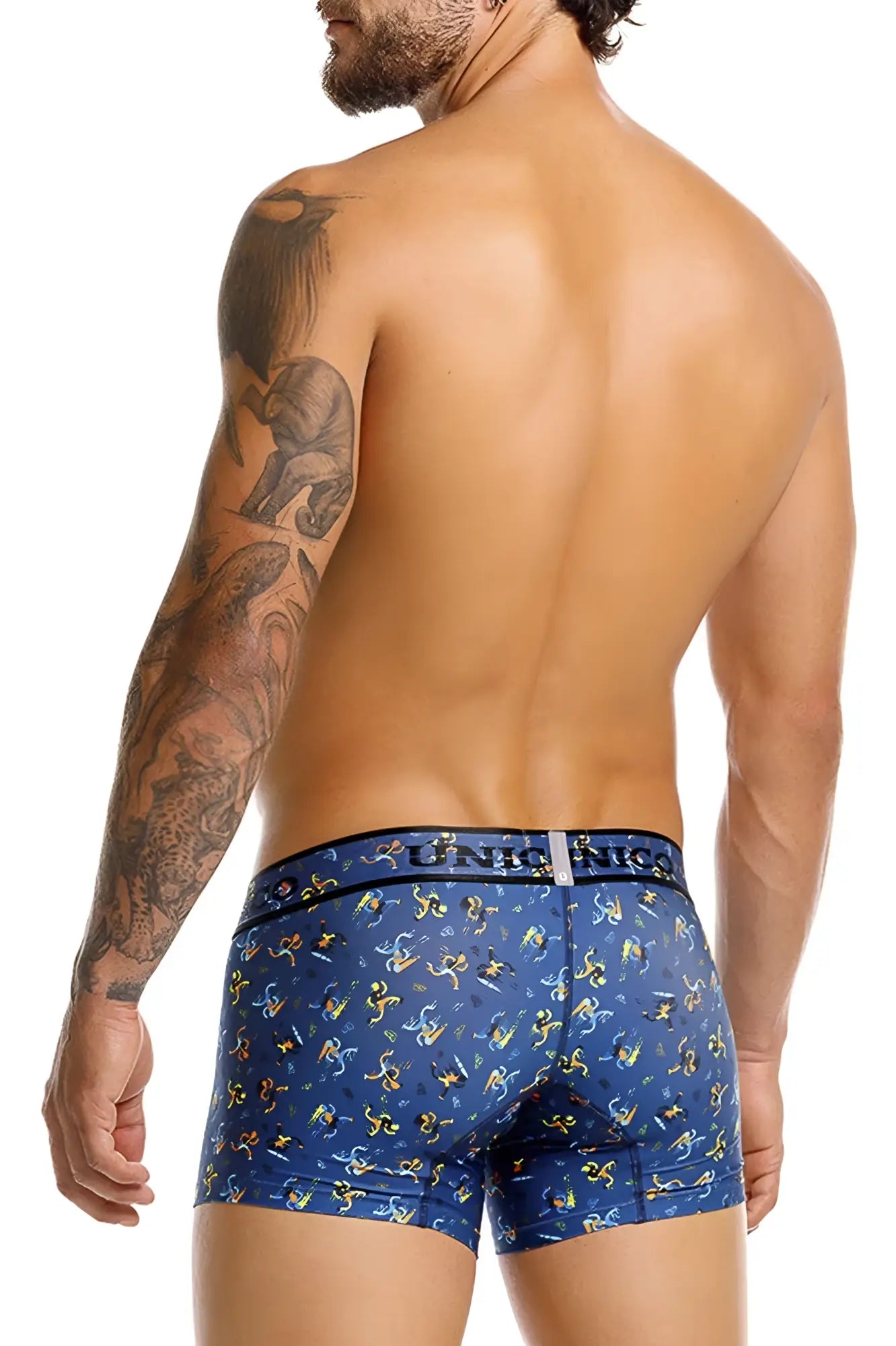 Blue boxer briefs with playful yellow and white cartoon figures and unico nics waistband in Pacer trunks color 46-blue