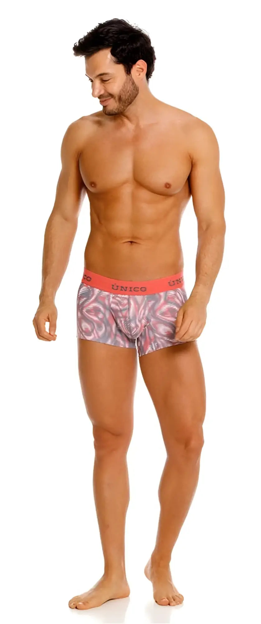 Patterned acanalado trunks with vibrant pink waistband and swirling gray white and black design by unico