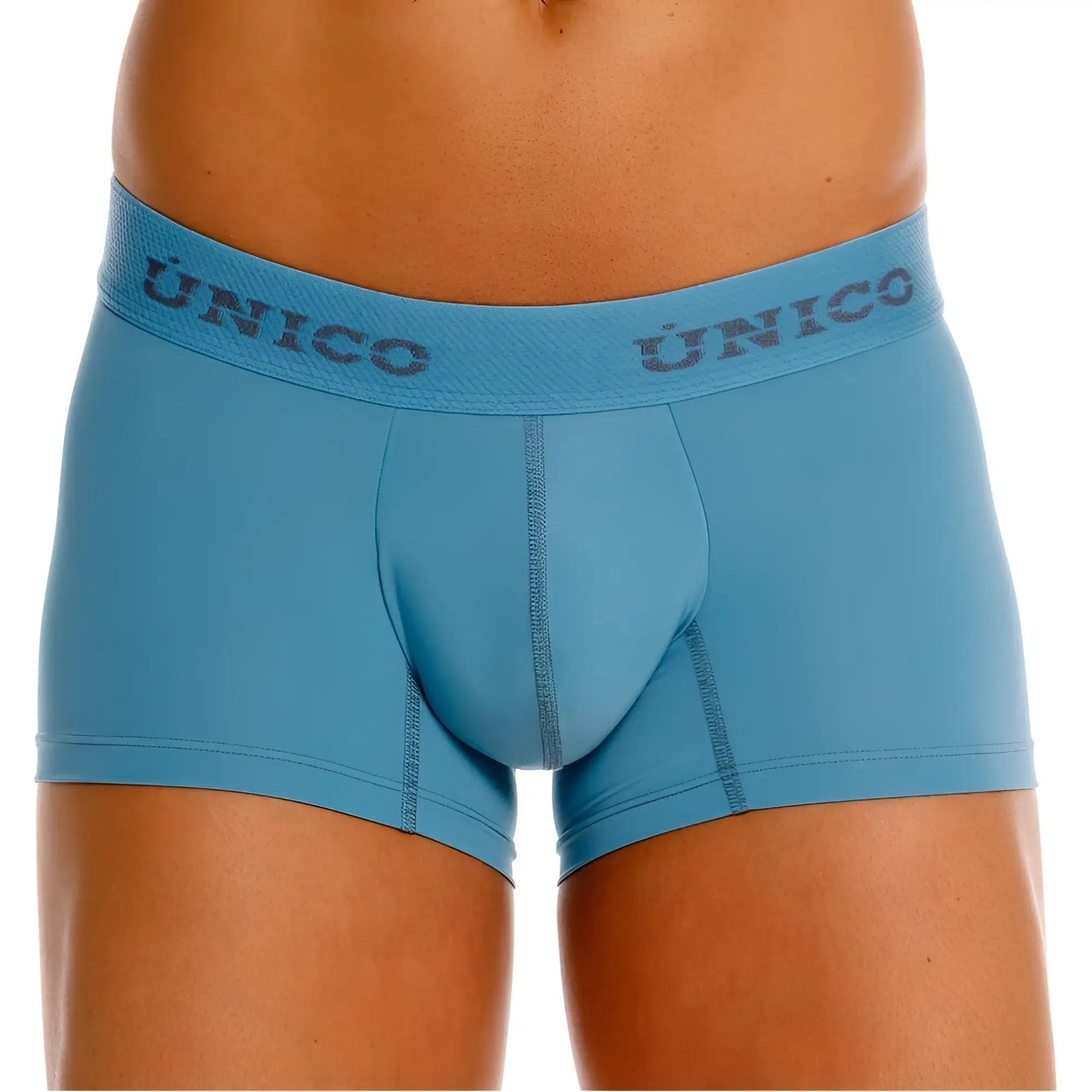 Light blue unico 26020100118 ventisca trunks with a textured waistband featuring gray unico branding