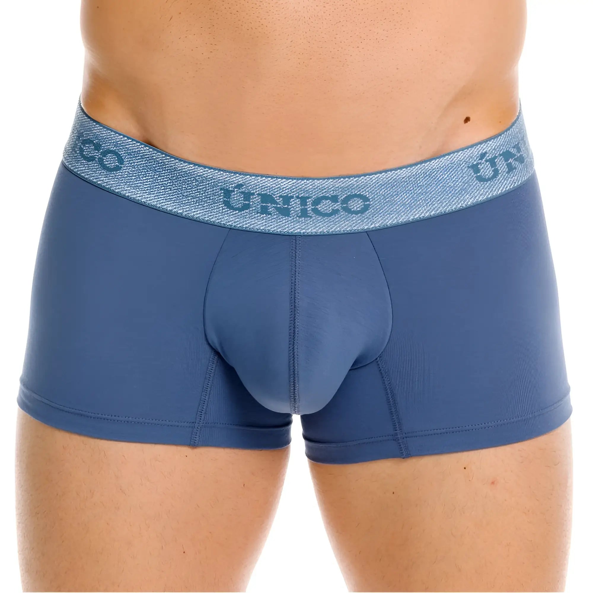 Blue unico men’s boxer briefs with textured waistband and matching blue branding in premium everyday teal color