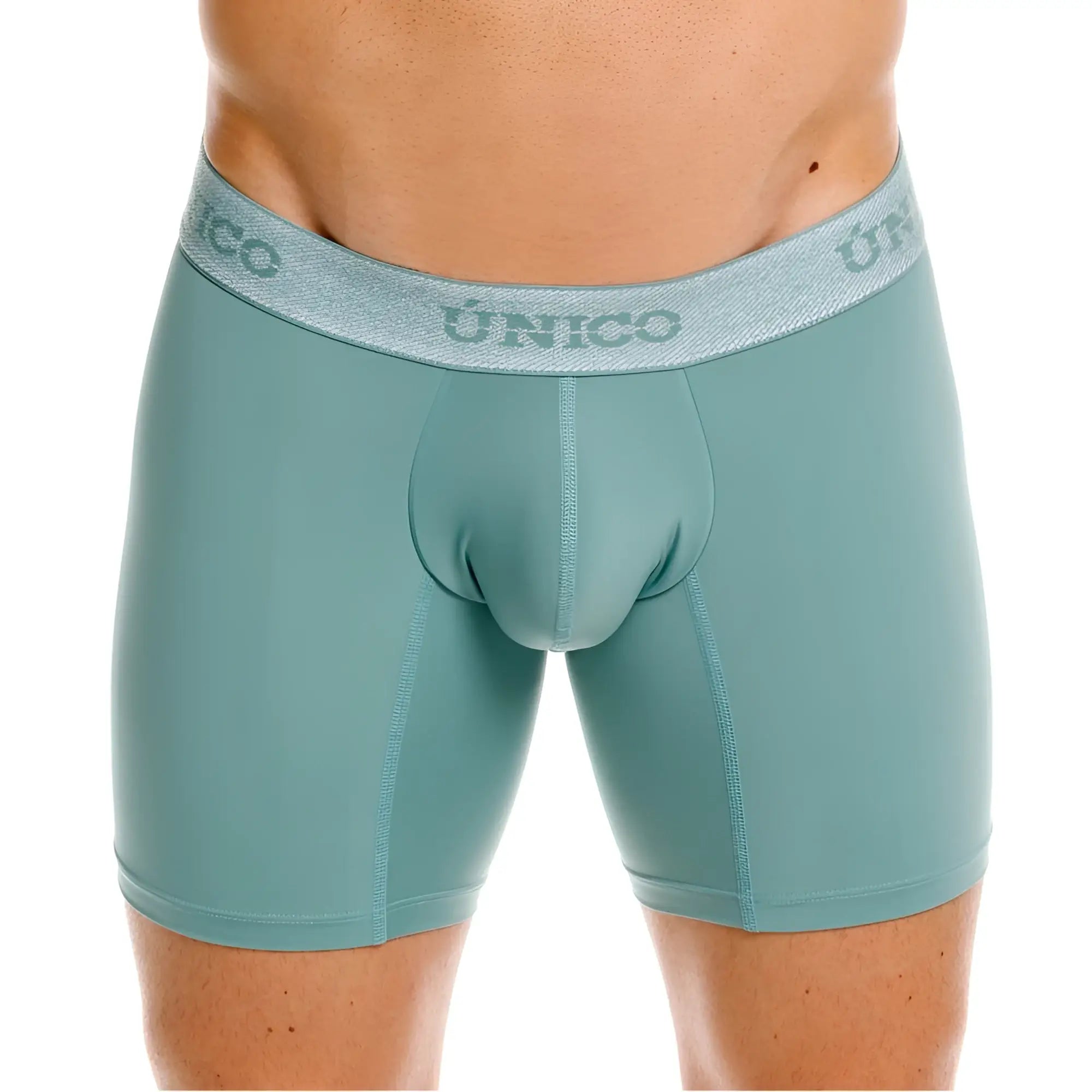 Teal ceramic boxer briefs with a textured gray waistband featuring the único brand logo color 43-green