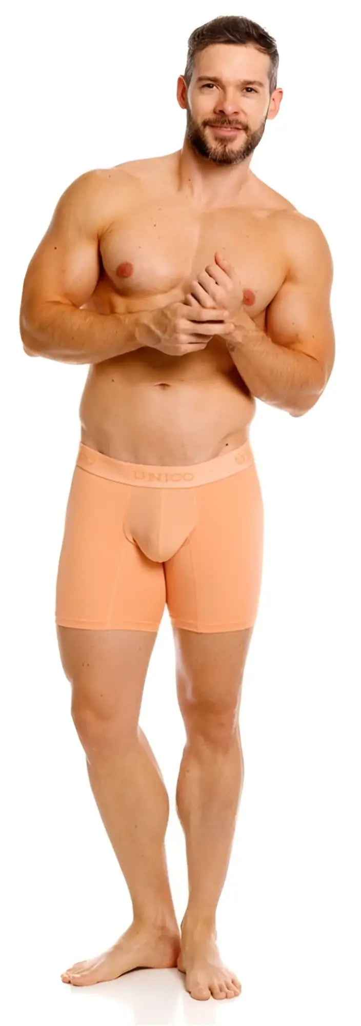Peach-colored unico 26040100222 classic boxer briefs with seamless design and branded waistband in apricot color