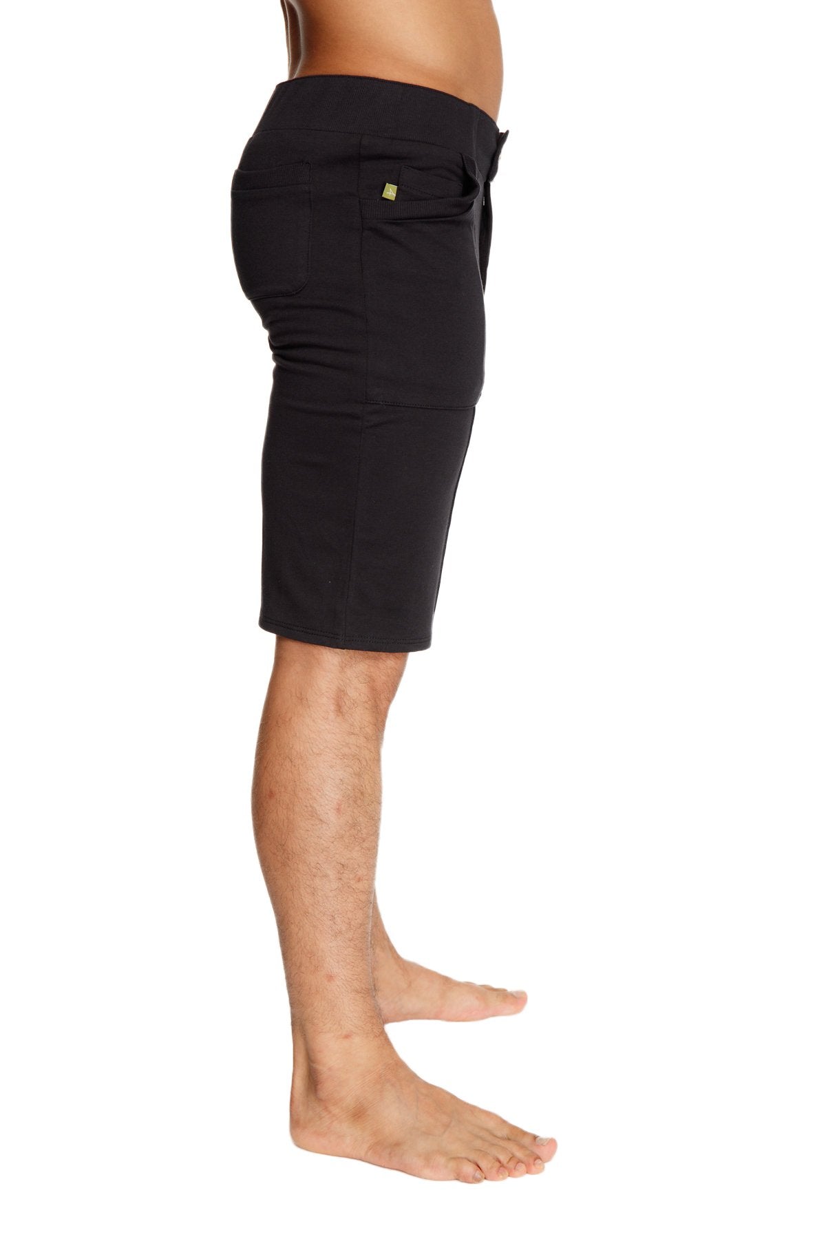 Black mid-thigh urban tactical at home dress shorts with drawstring waist and small yellow logo on side pocket