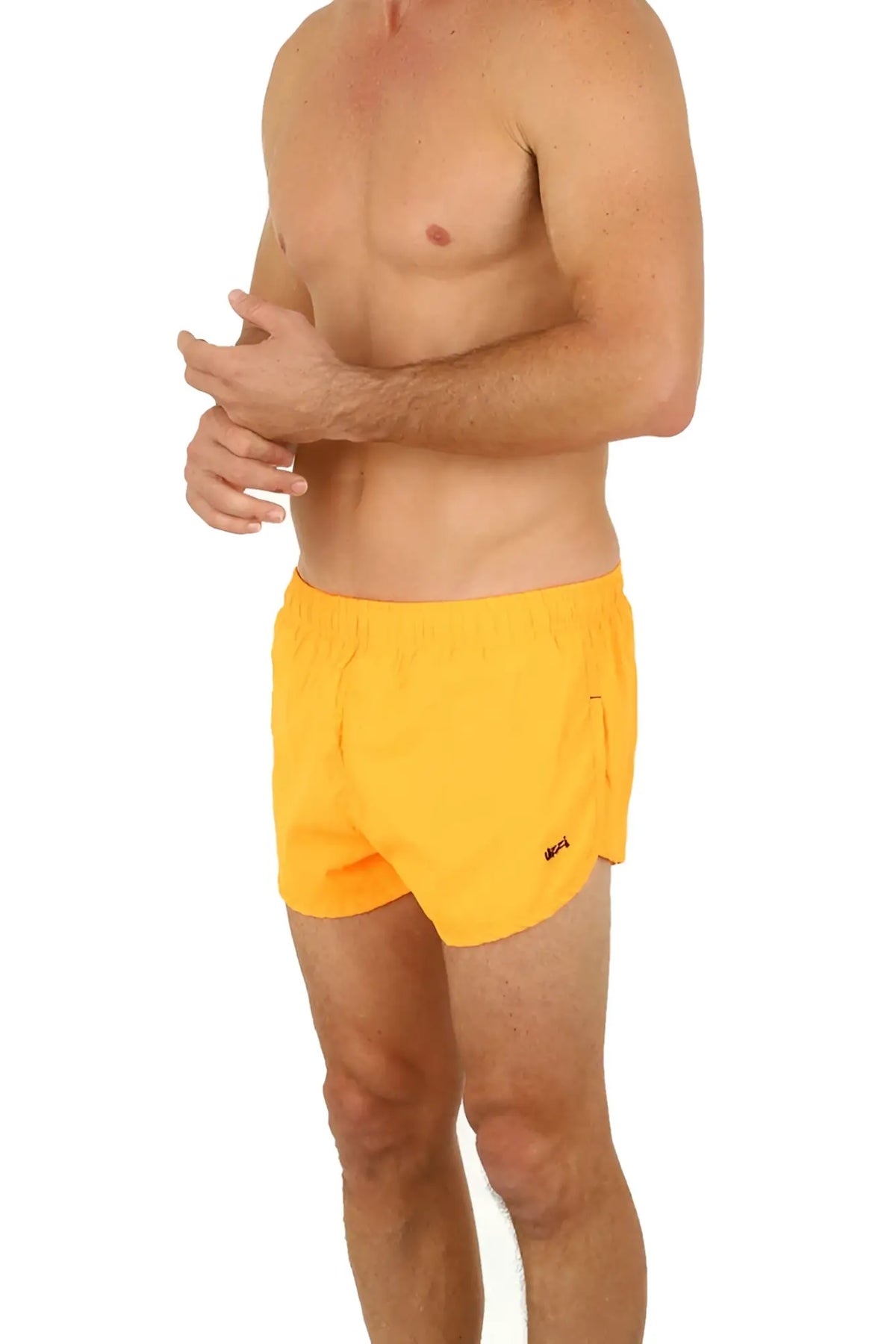Uzzi running short bright yellow athletic shorts with elastic waistband and small side logo for running