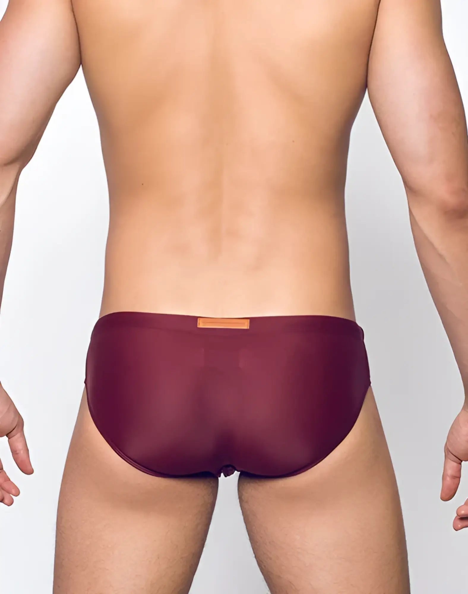 V10 core bikini maroon mesh briefs with a small orange label at the waistband for comfortable everyday wear