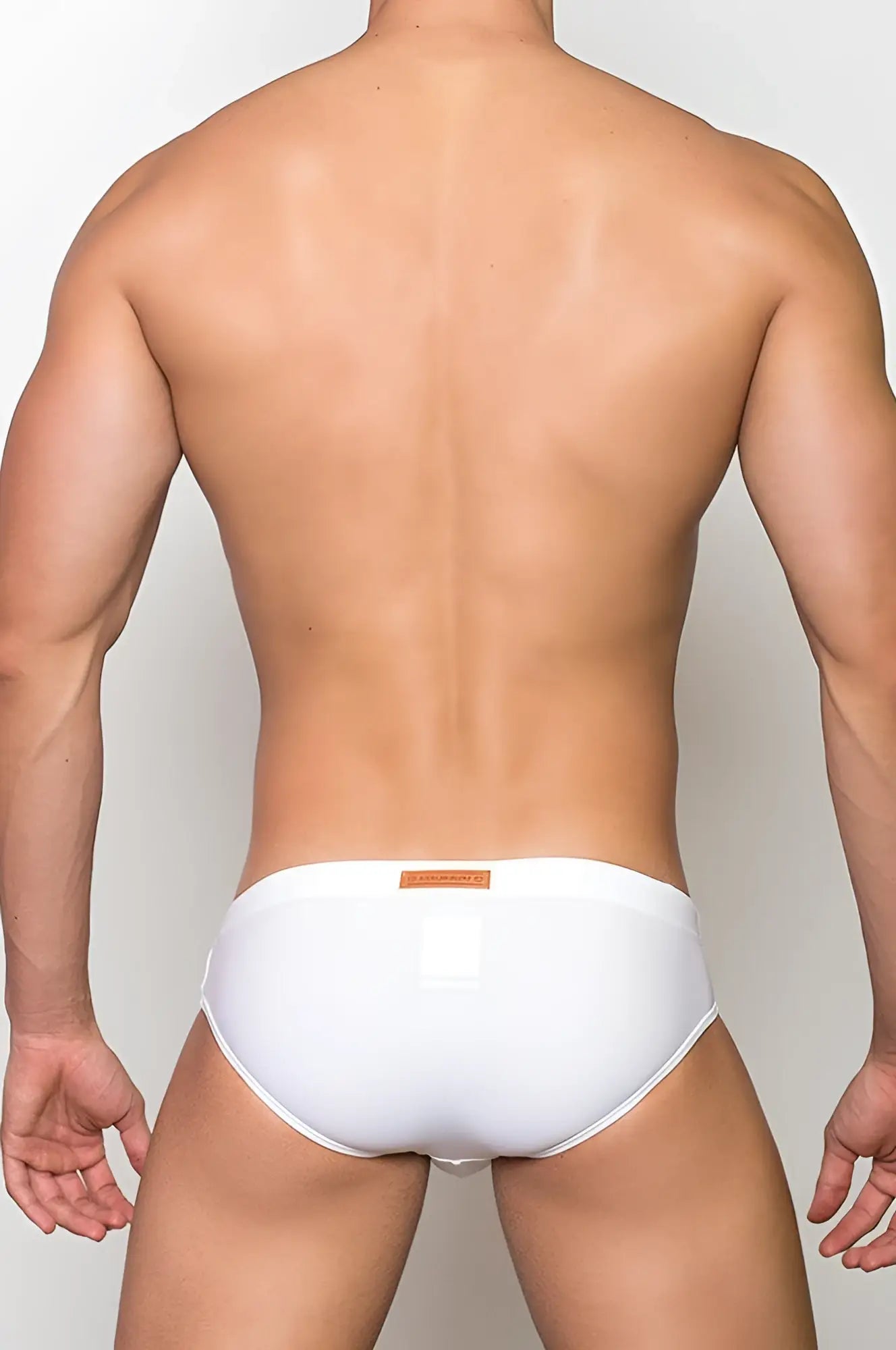 White briefs v10 core bikini with small orange label on waistband in soft breathable fabric for everyday comfort