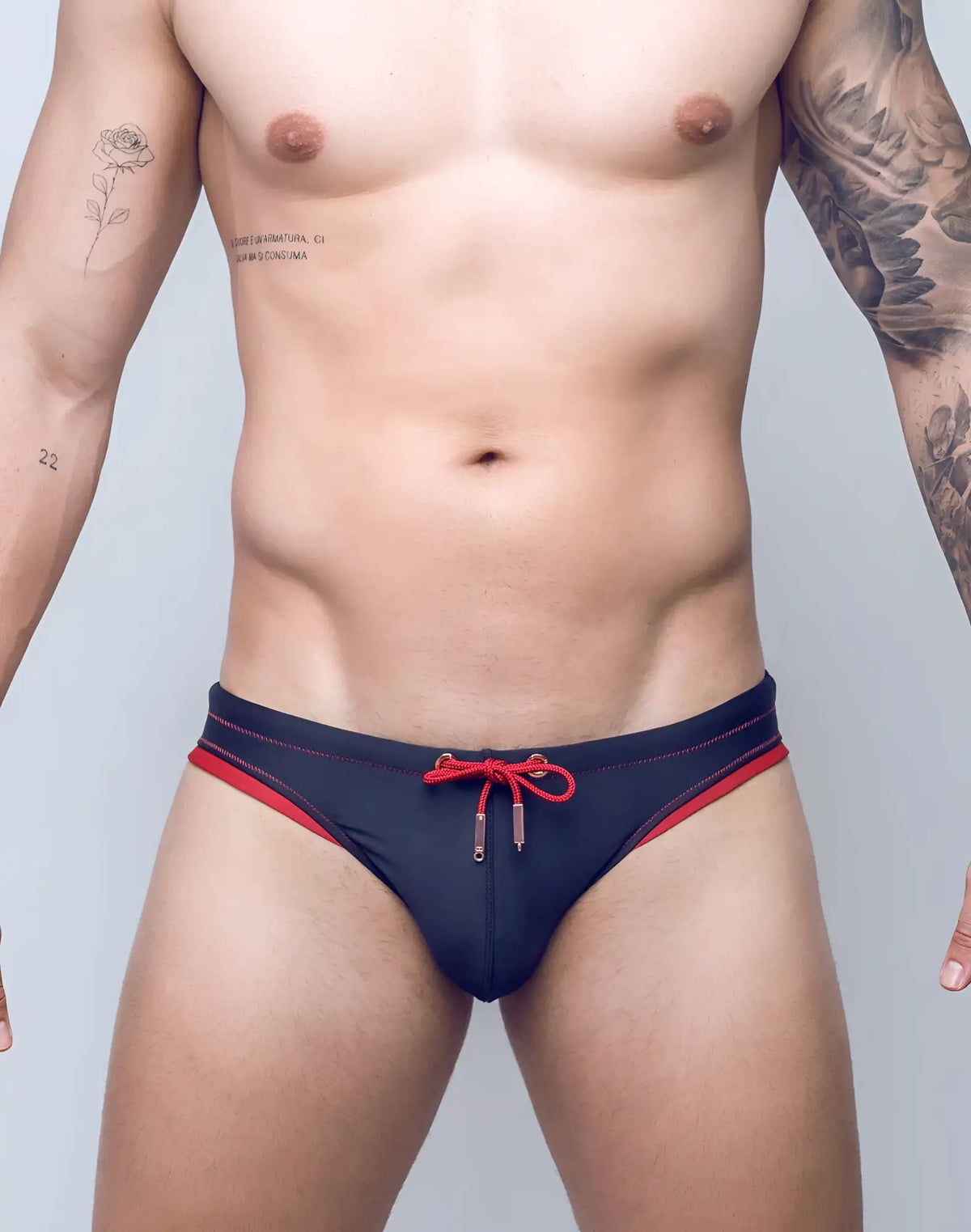 Navy blue V22 Rapid swim brief with red trim and matching red drawstring tie designed for quick drying