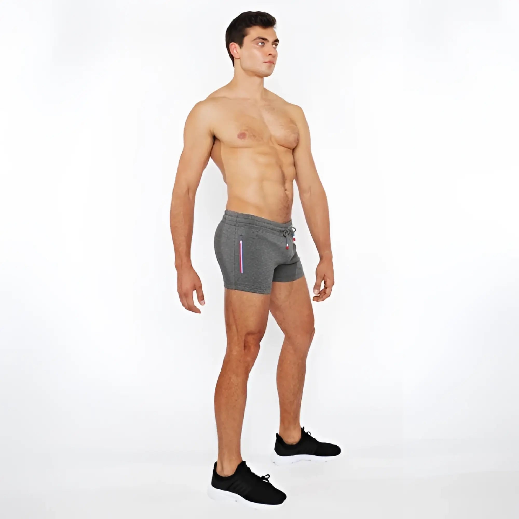 Gray vault gym-tech shorts with drawstring waist and subtle vertical stripes featuring 3 color heat weld zippers