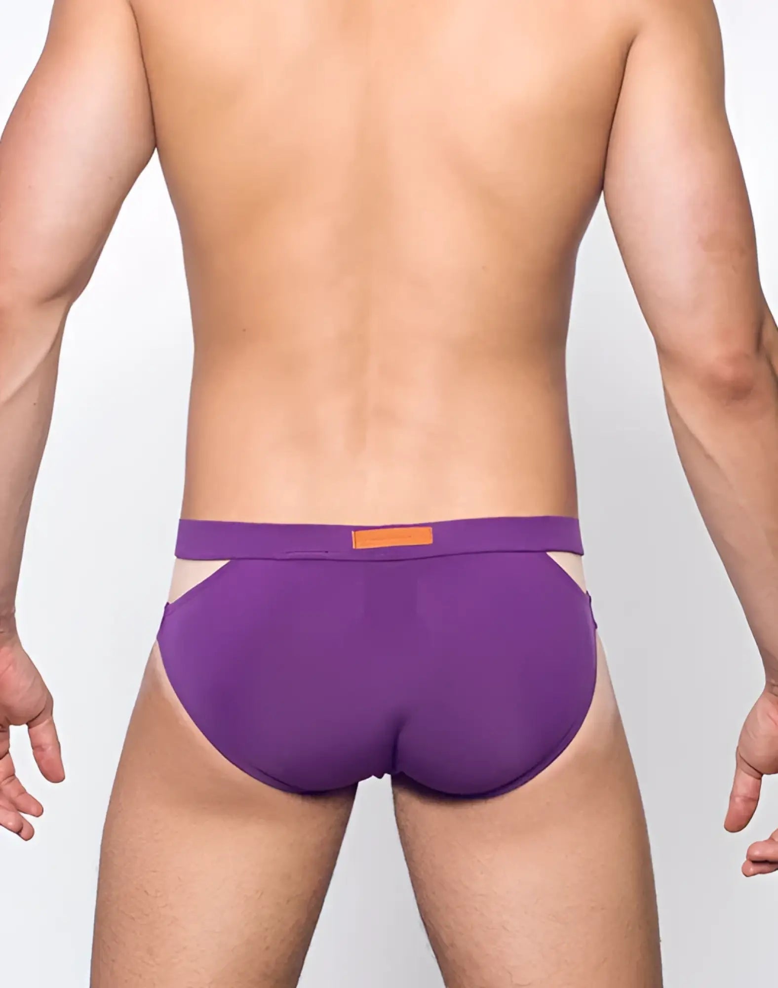 Purple vb21 blk label swim brief athletic briefs with orange rectangular tag on waistband for swimming and sports