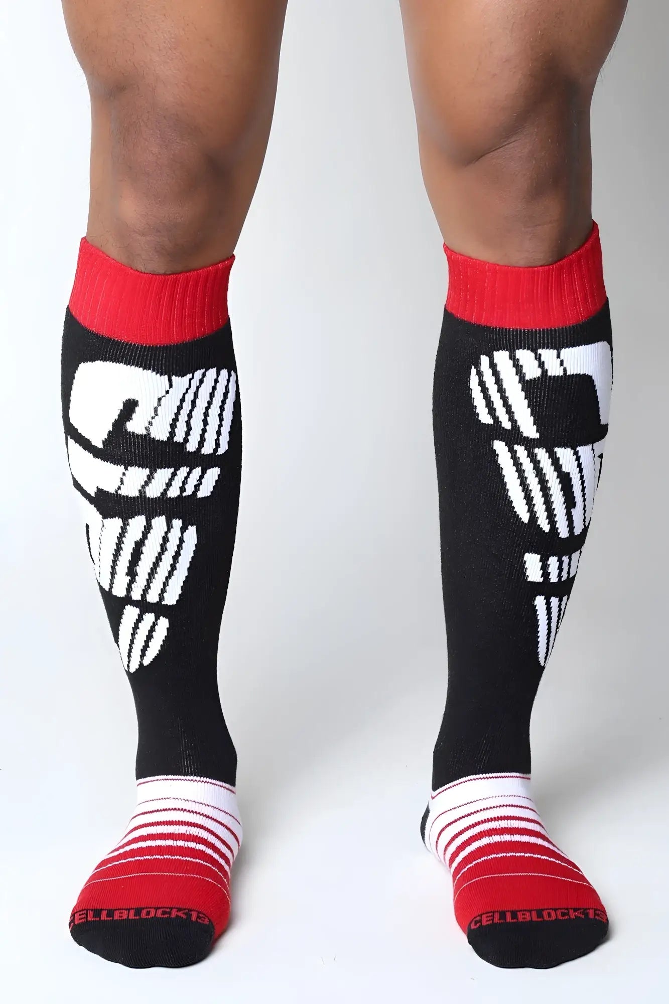 Black knee high socks velocity 2.0 with white cellblock 13 logo and red ribbed cuffs and toe sections