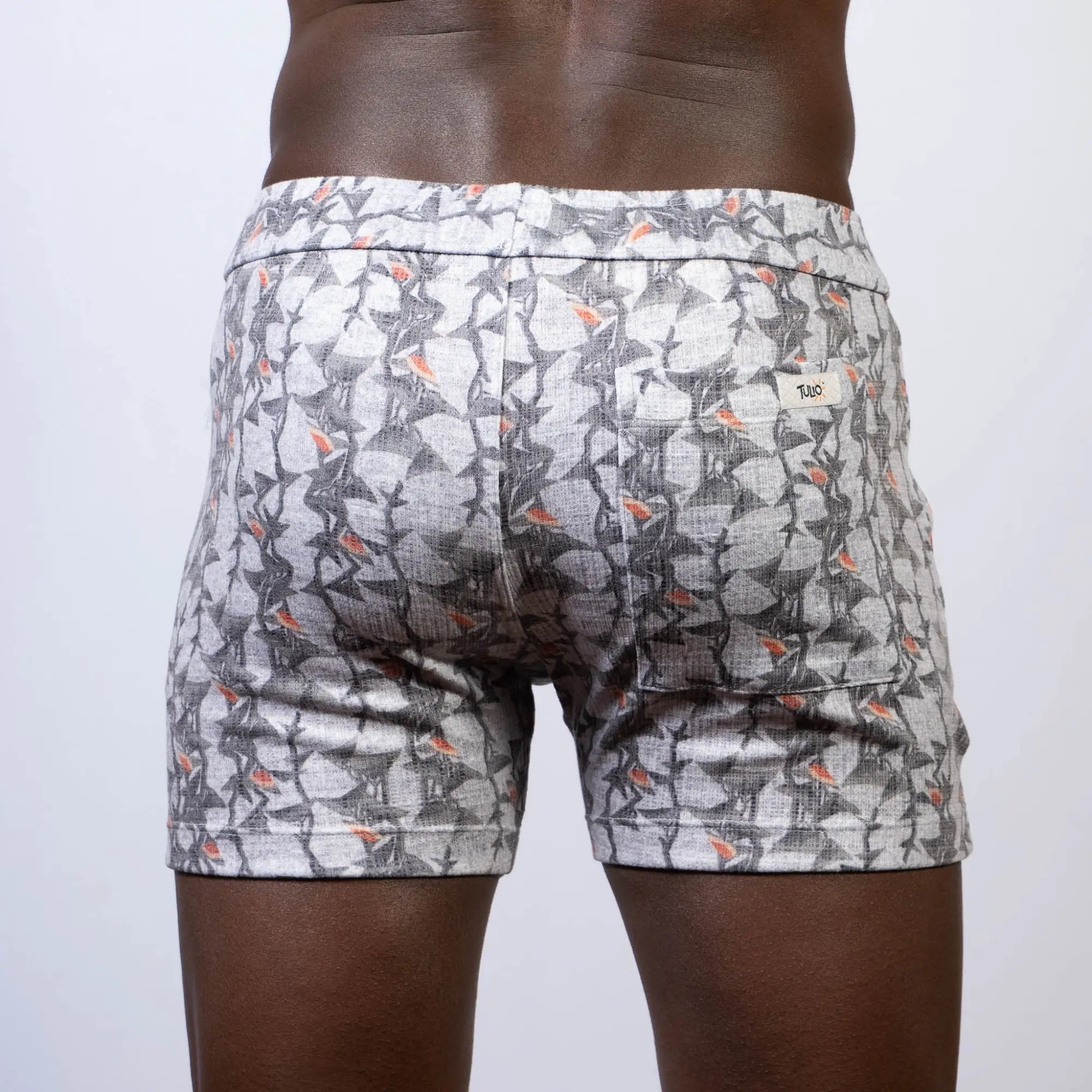 Vintage stripes linen texture shorts in gray and white with a subtle orange accent and elastic waistband