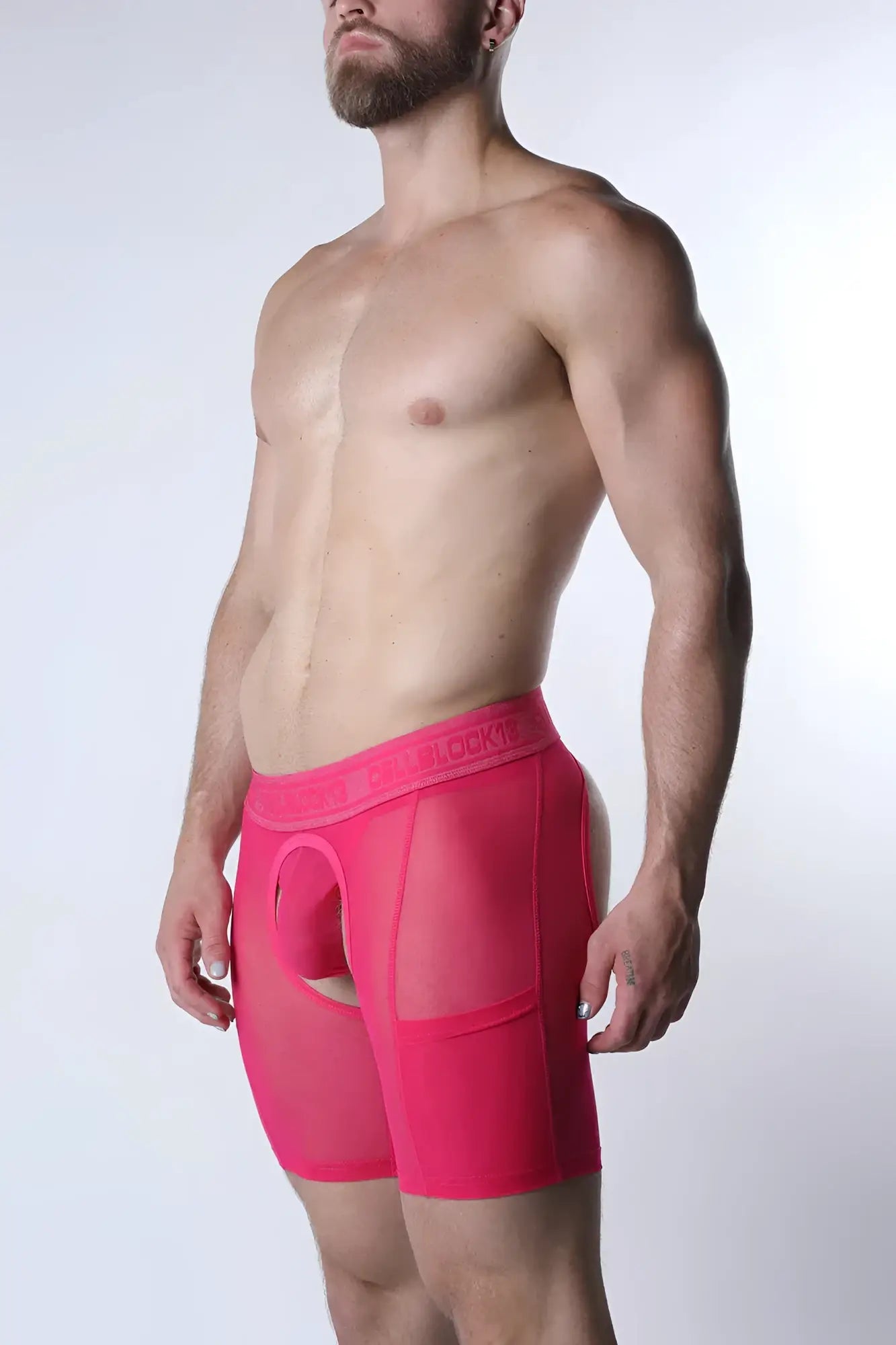 Bright pink sheer mesh boxer briefs with solid fabric waistband from the void chap short collection