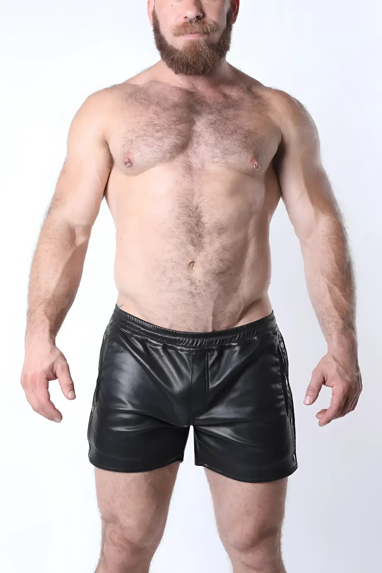 Black faux leather void snap up short with shiny smooth texture and side zippers