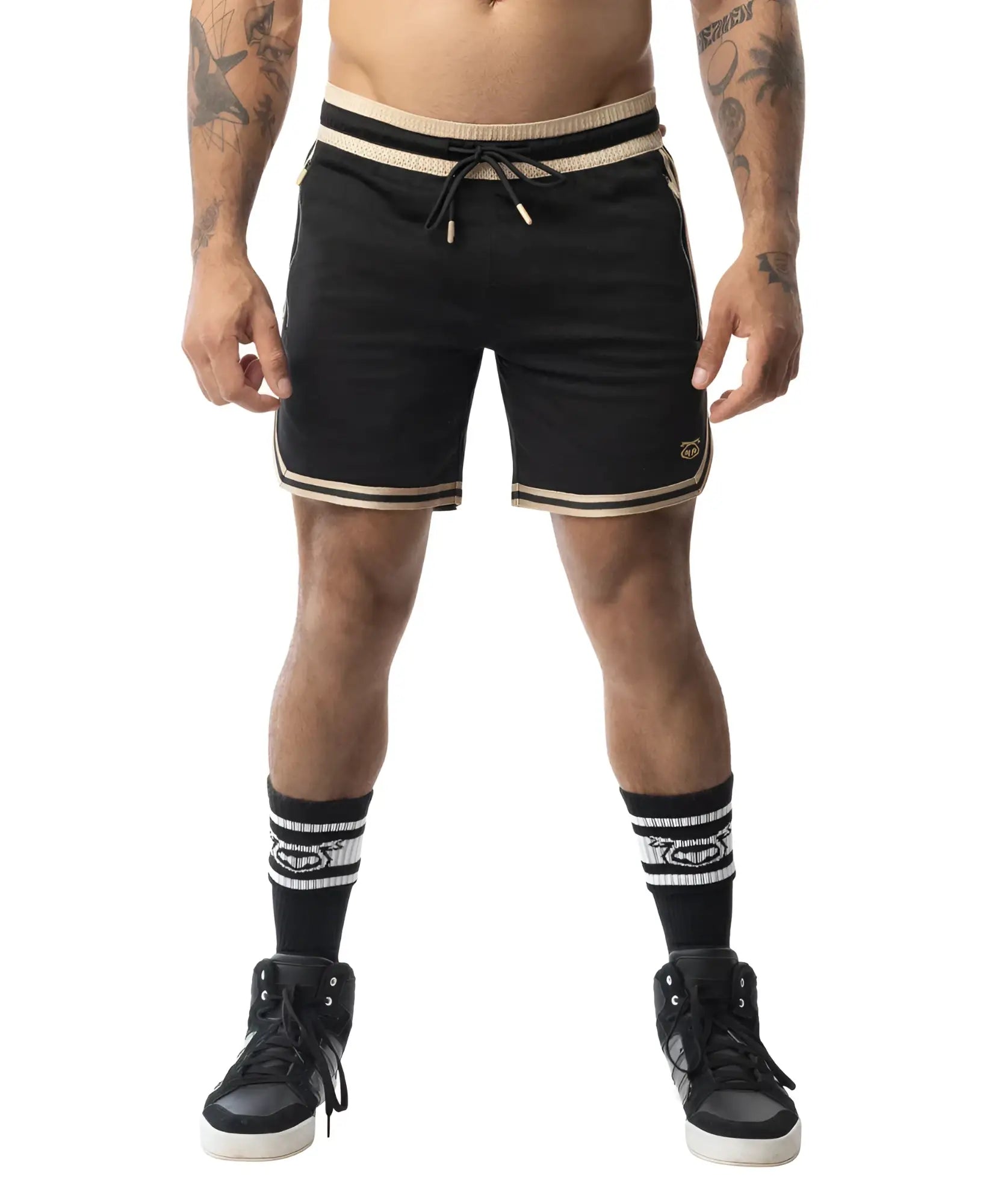 Black warm up rugby shorts with beige trim and drawstring waistband designed for athletic use
