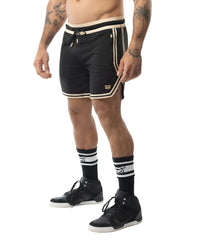 Warm up rugby short black athletic shorts with cream trim side stripes and small embroidered logo on lower left leg