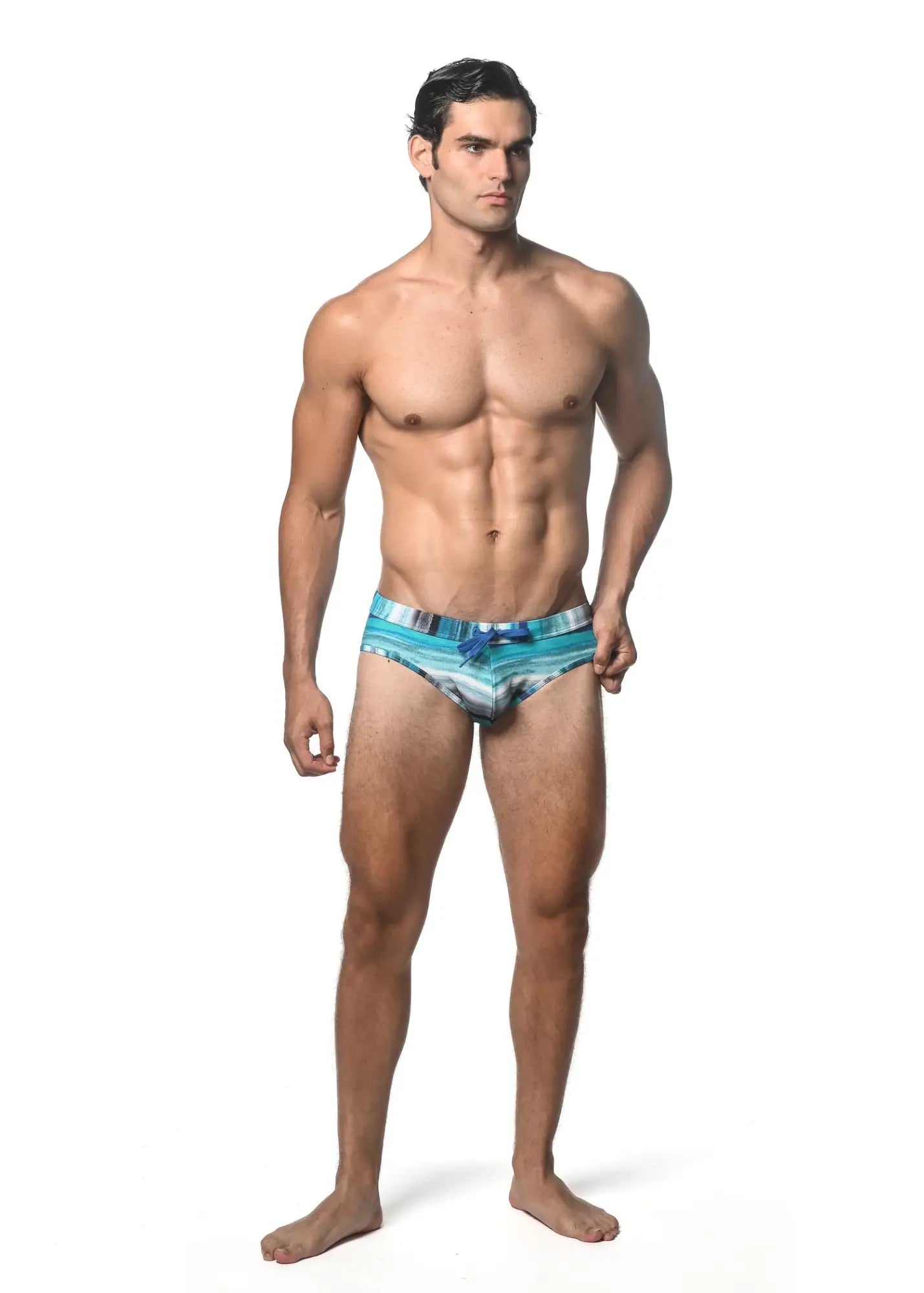 Men’s watercolor stripe printed swim brief in blue and white with a bow detail for swimming and beachwear