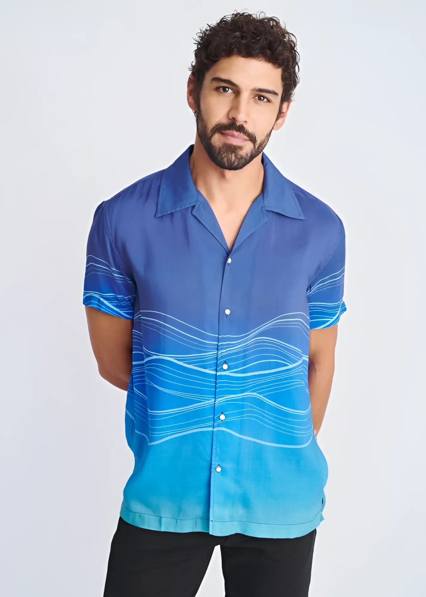 Blue gradient short-sleeved modal shirt with white wavy line pattern featuring waves border print design