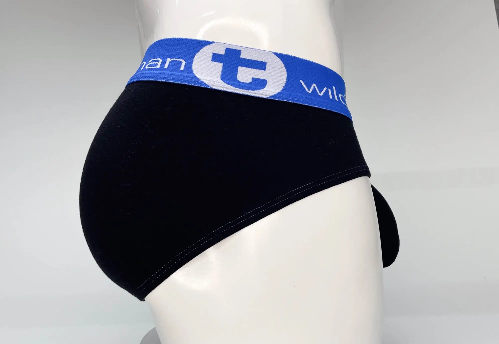 Black cotton briefs with a blue elastic waistband featuring the t wild logo wildmant big boy pouch cotton brief