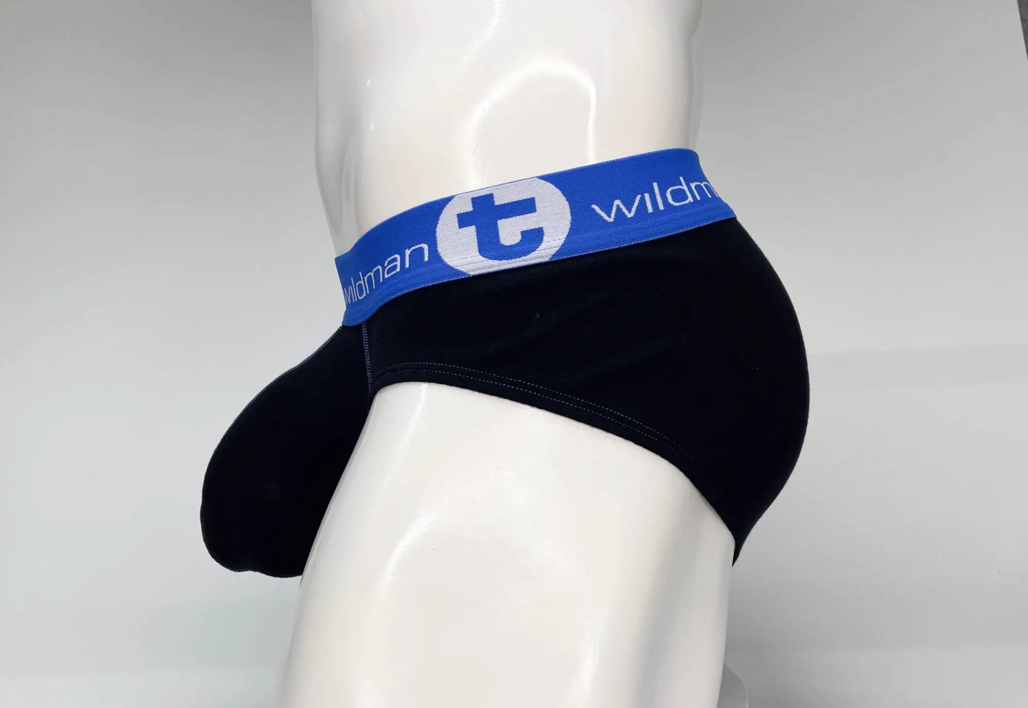 Black wildman big boy pouch cotton briefs with blue elastic waistband featuring t logo and text