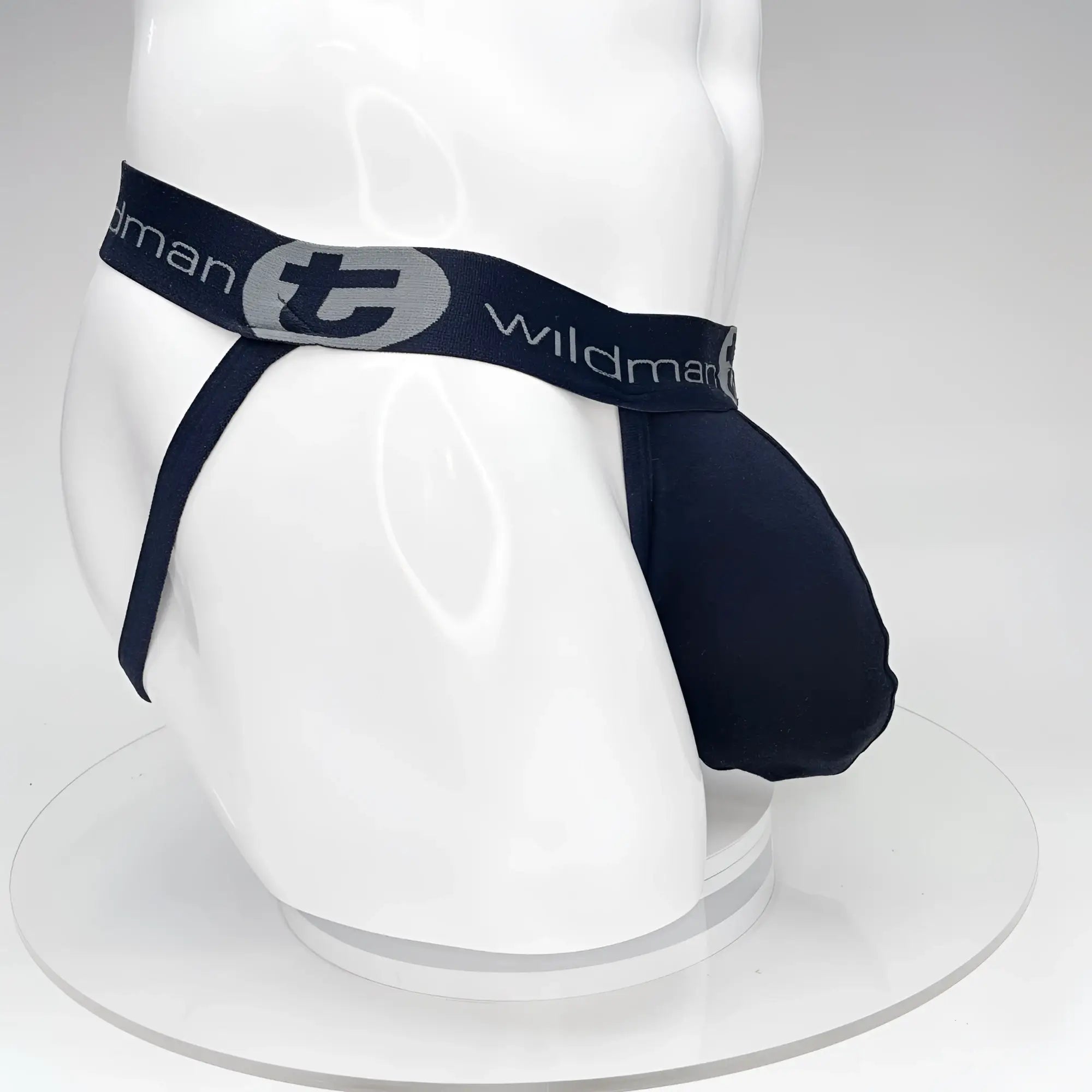 Navy blue wildman brand big boy pouch jockstrap with elastic waistband and logo detailing for support and comfort