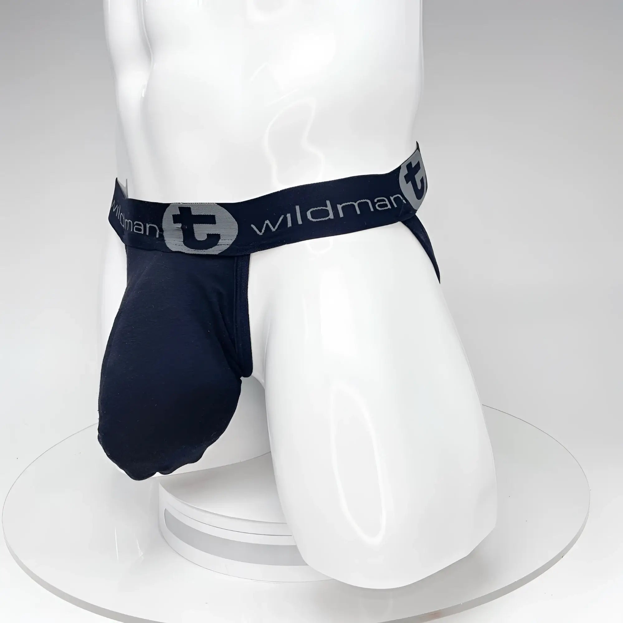 Navy blue wildman big boy pouch jockstrap with gray logo band for support and comfort