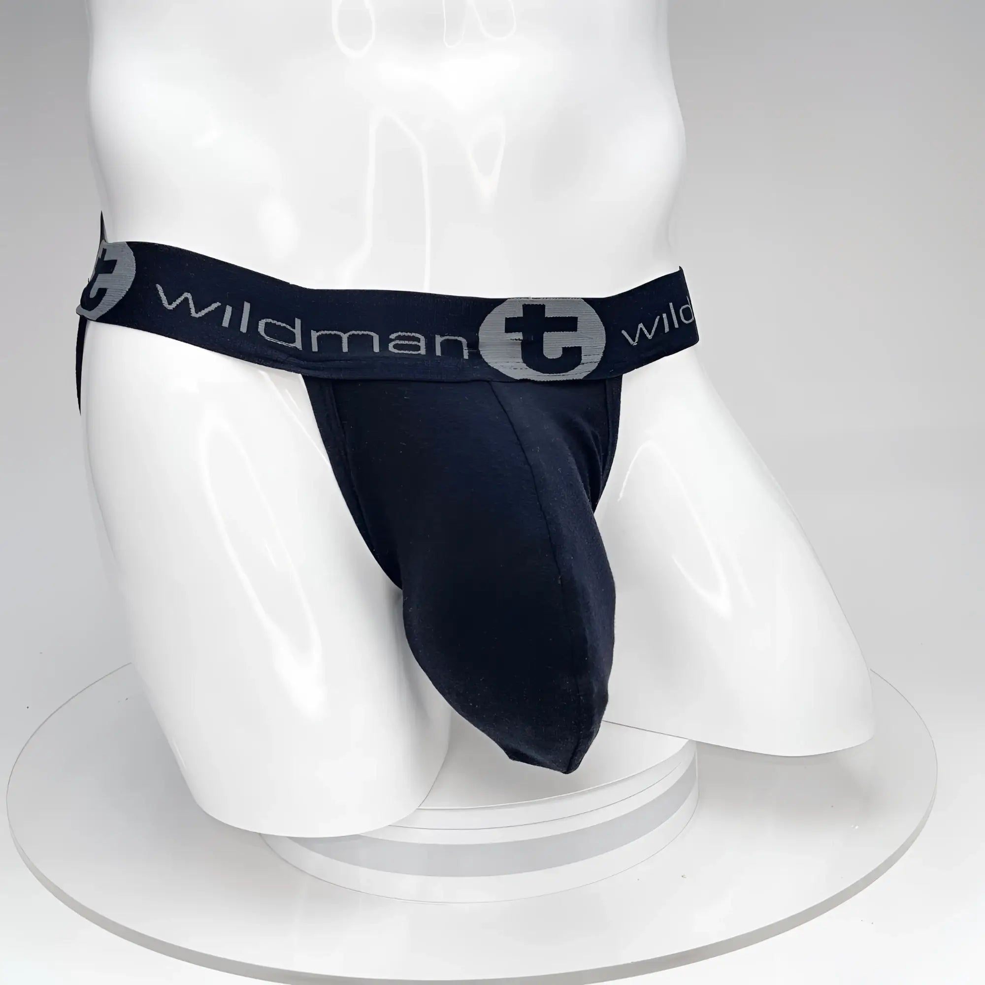 Black Wildman brand jockstrap with contoured design and elastic waistband featuring Wildman logo in black