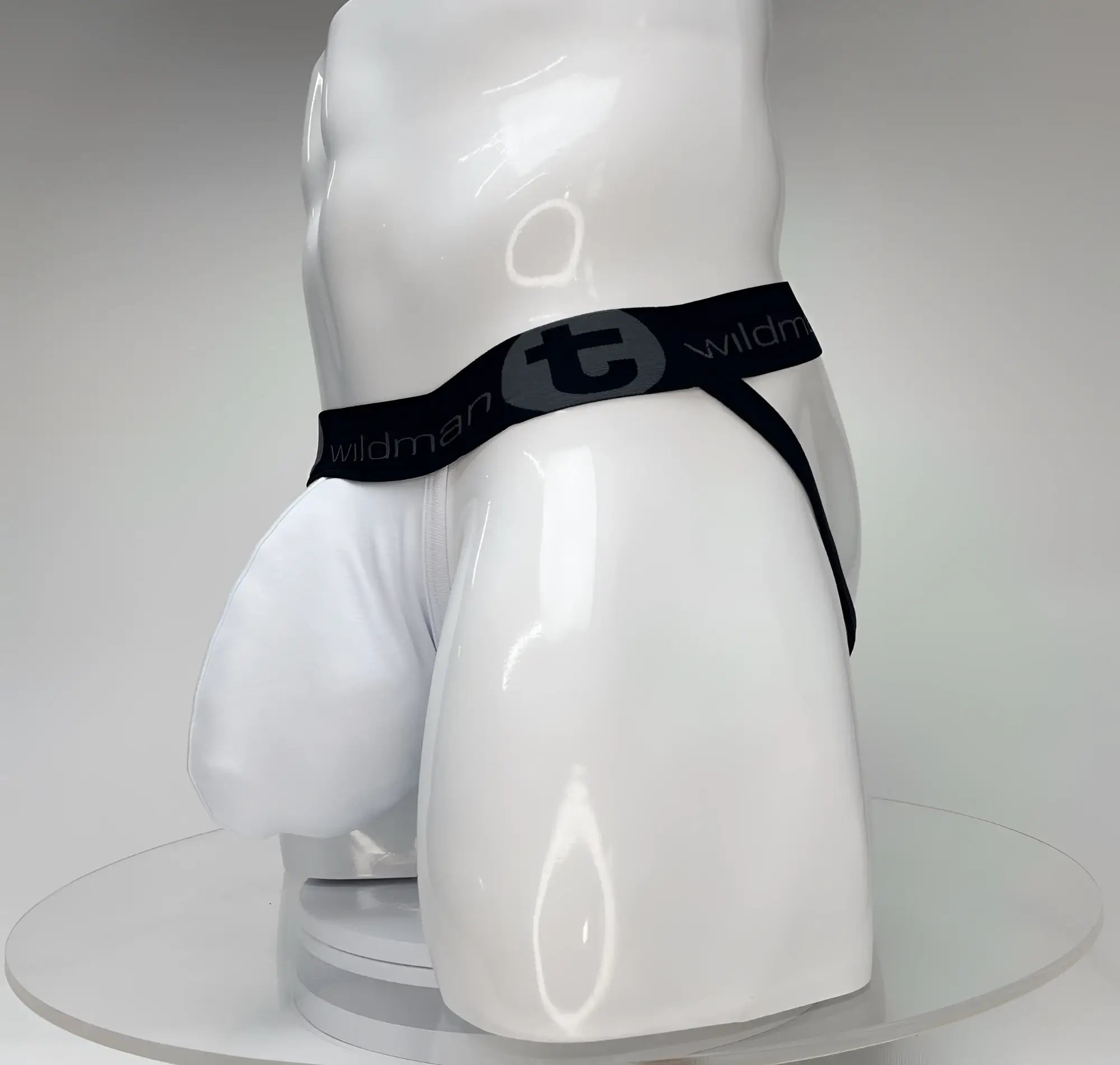 Wildmant big boy pouch jockstrap in white with black elastic waistband featuring t logo and branding