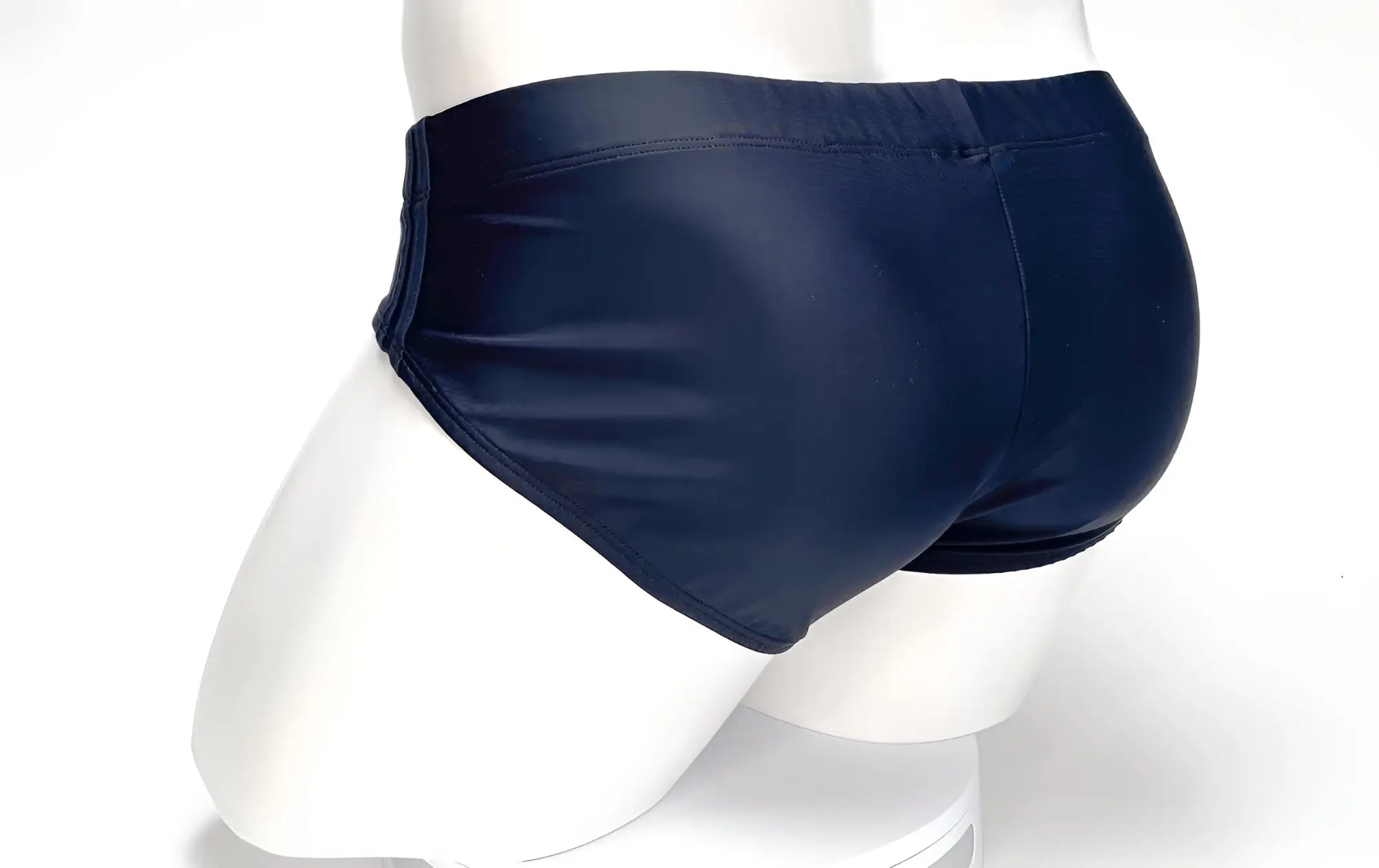 Wildmant big boy pouch swim brief in black with a smooth glossy finish designed for comfortable swimwear use