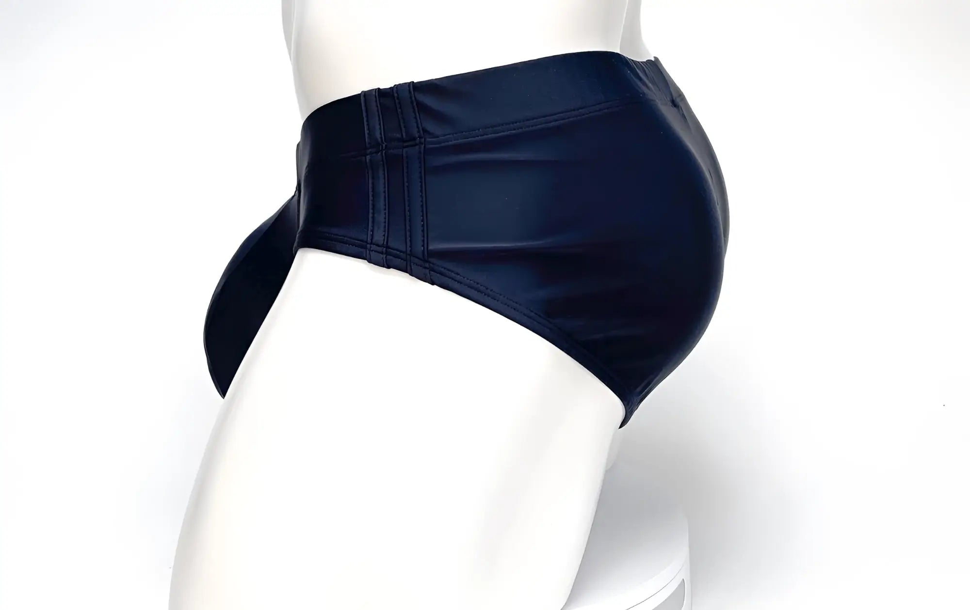 Wildmant big boy pouch swim brief black in navy blue faux leather with high-waisted design and side tabs visible