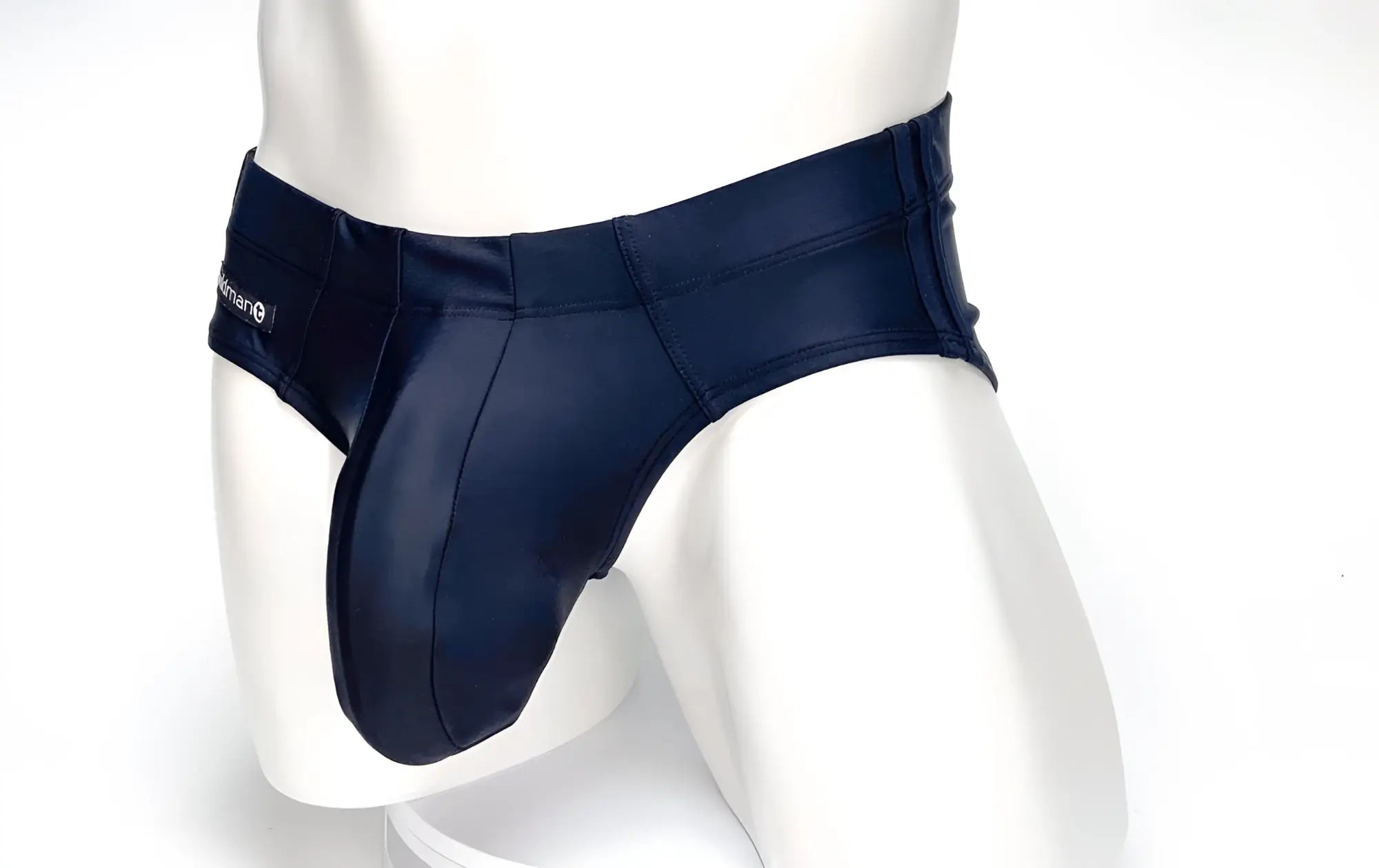 Wildmant big boy pouch swim brief in navy blue shiny fabric with contoured design and logo waistband