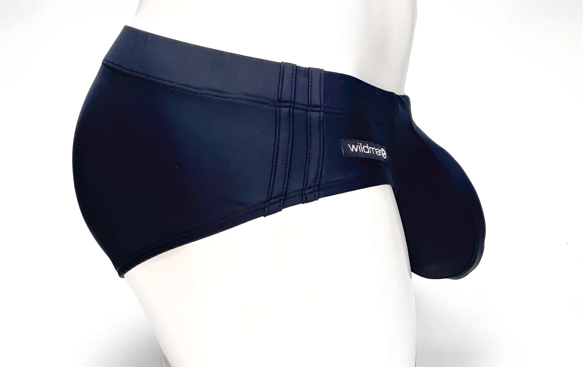 Wildmant big boy pouch swim brief in navy blue stretch fabric with contoured design and wichter brand label on waistband