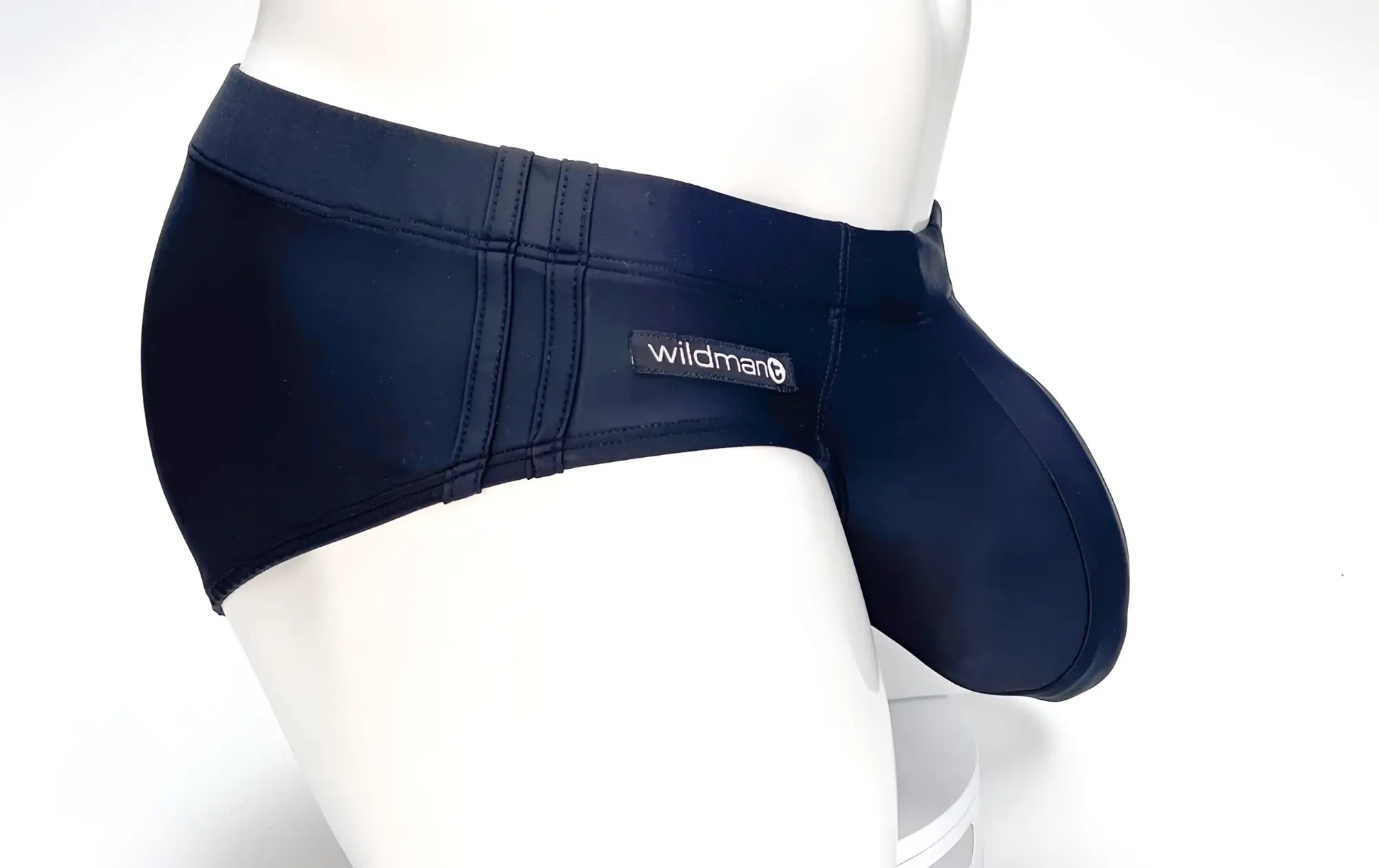 Navy blue stretch fabric briefs with wildman brand label on waistband wildmant big boy pouch swim brief black