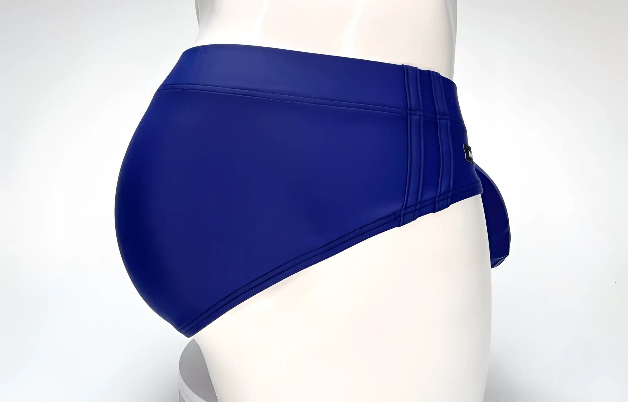 WildmanT big boy pouch swim brief navy in royal blue faux leather with sleek tailored fit and subtle stitching details