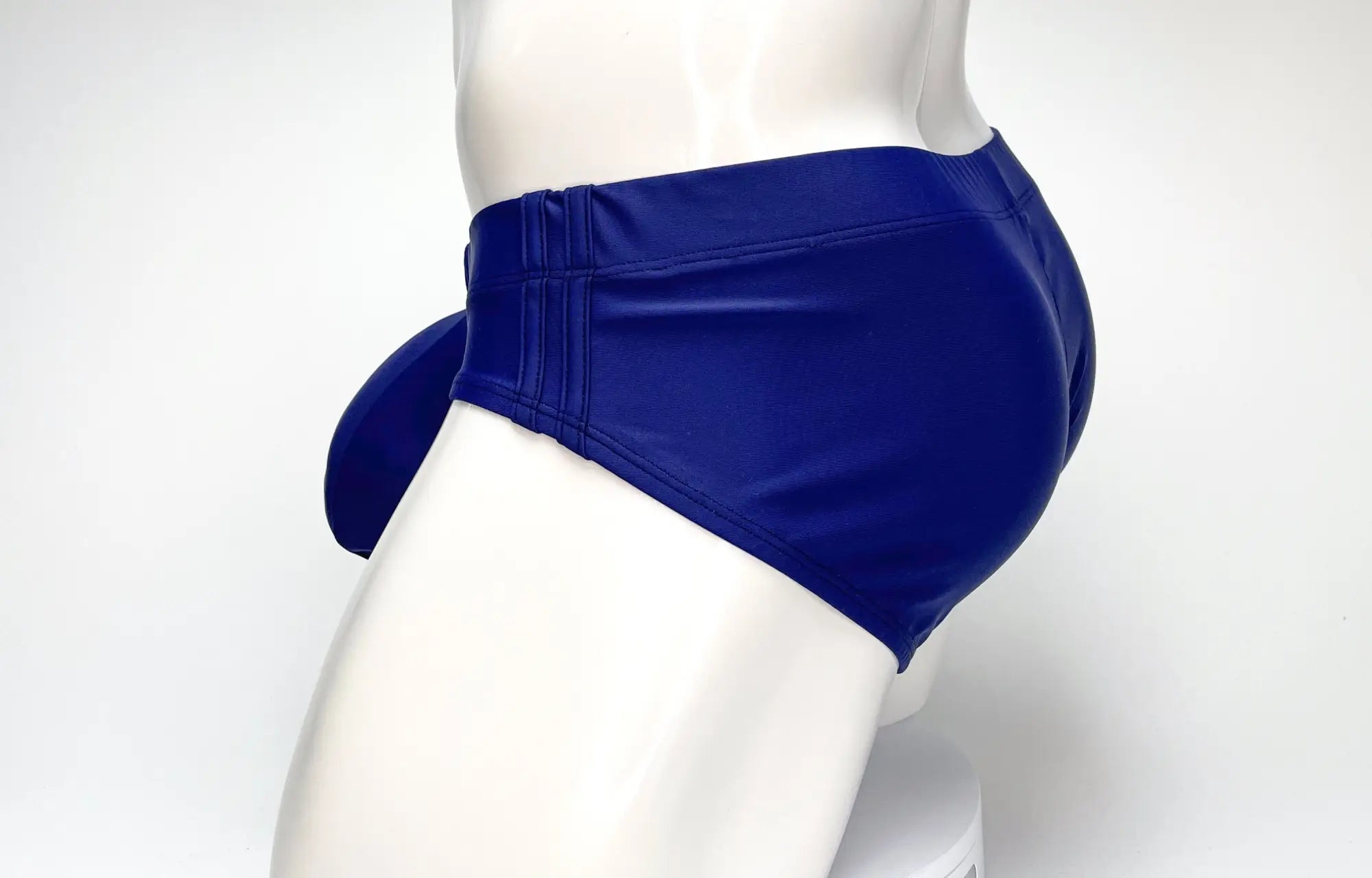 Wildmant big boy pouch swim brief navy in royal blue glossy faux leather with tailored fit and side tie detail