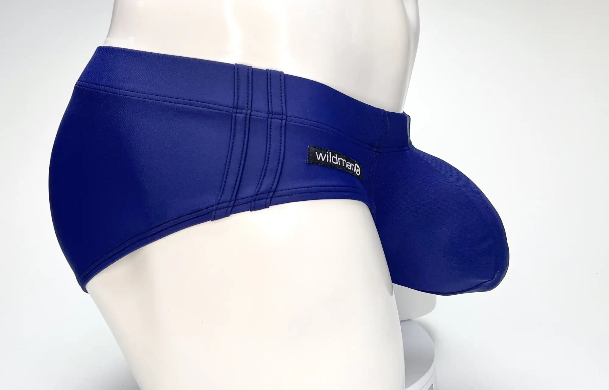 Wildmant big boy pouch swim brief navy in royal blue glossy nylon with contoured design and wildmen brand label on waistband