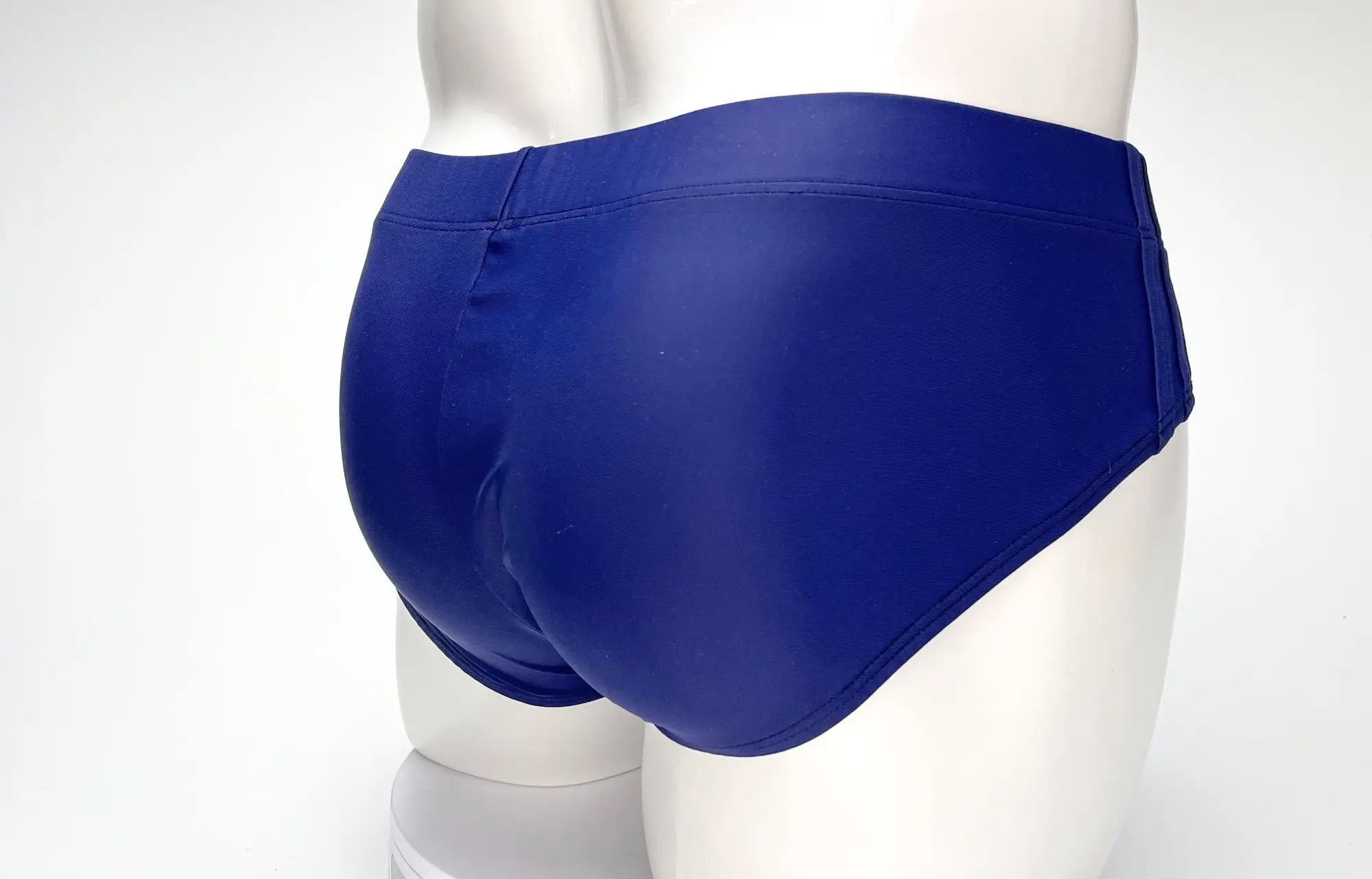 Wildmant big boy pouch swim brief in navy royal blue with smooth glossy finish and snug fit