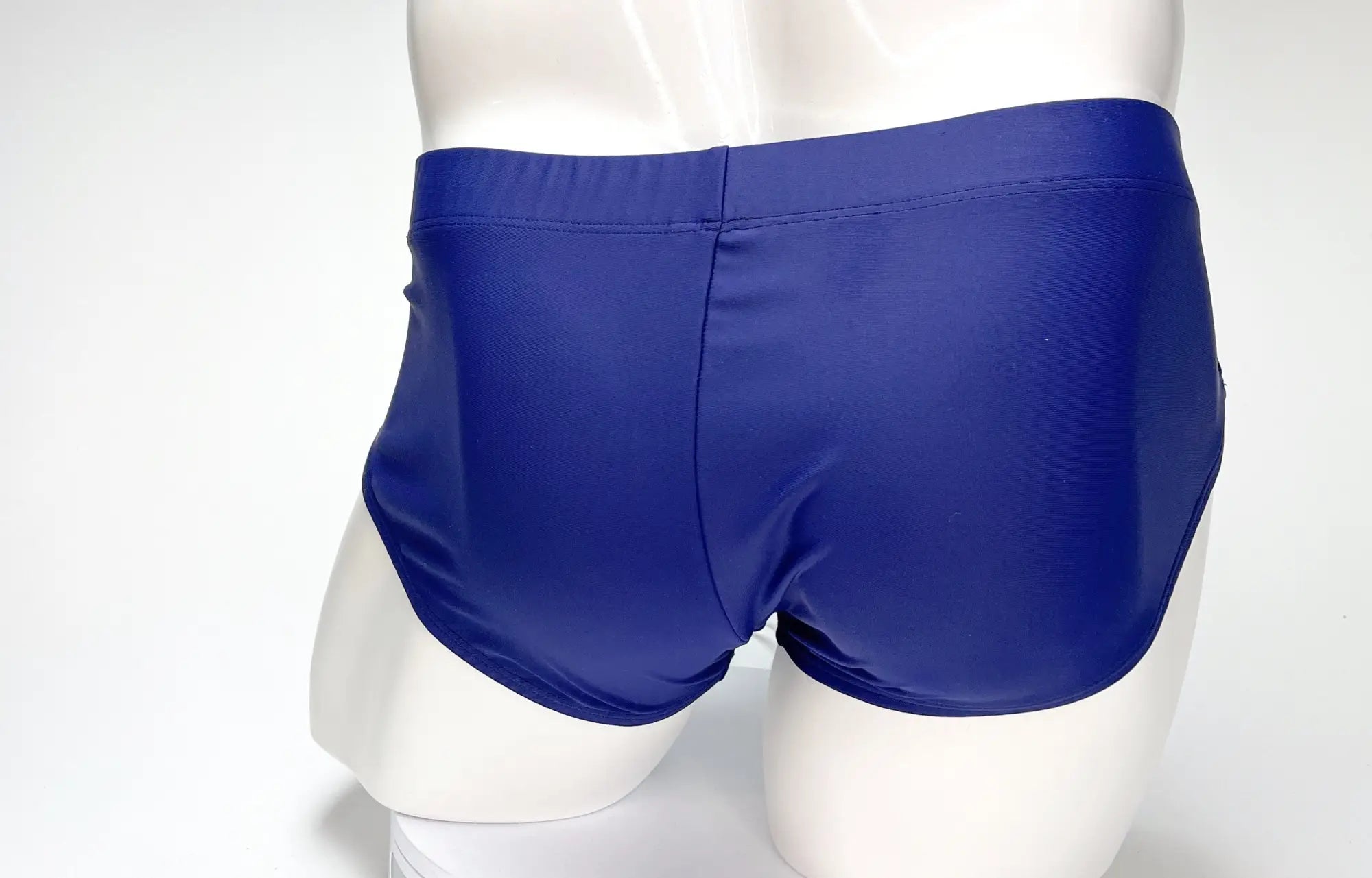 Wildmant big boy pouch swim brief navy royal blue with smooth glossy fabric finish designed for swimming and beachwear