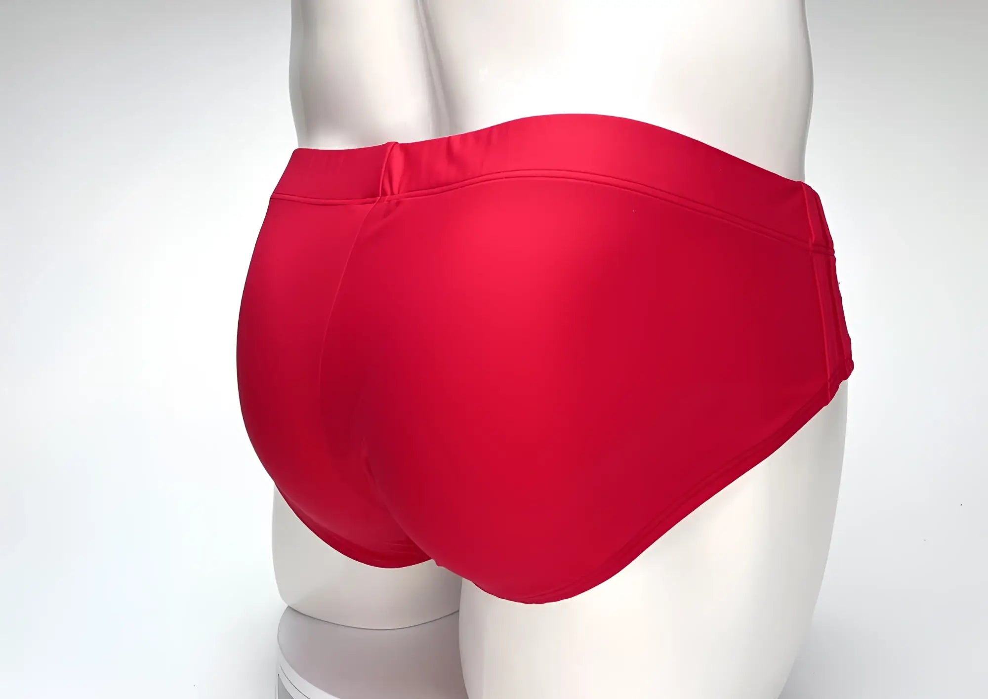 Wildmant big boy pouch swim brief in bright red satin fabric with a snug fit designed for swimming