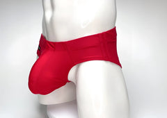 Wildmant big boy pouch swim brief in red featuring a supportive contoured design and smooth fabric for men